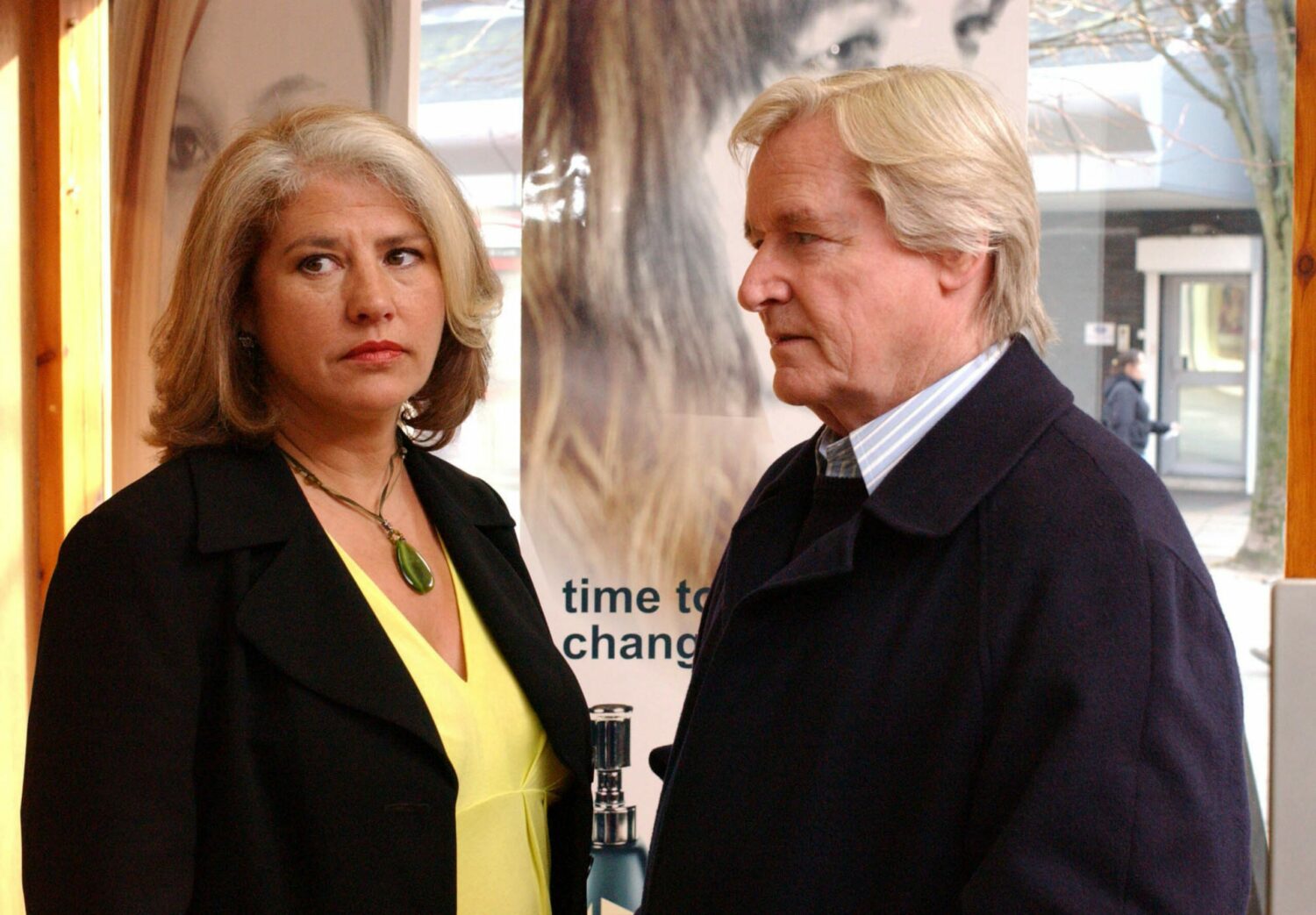 Denise Osbourne in looks shifty in Coronation Street while legend Ken Barlow watches her