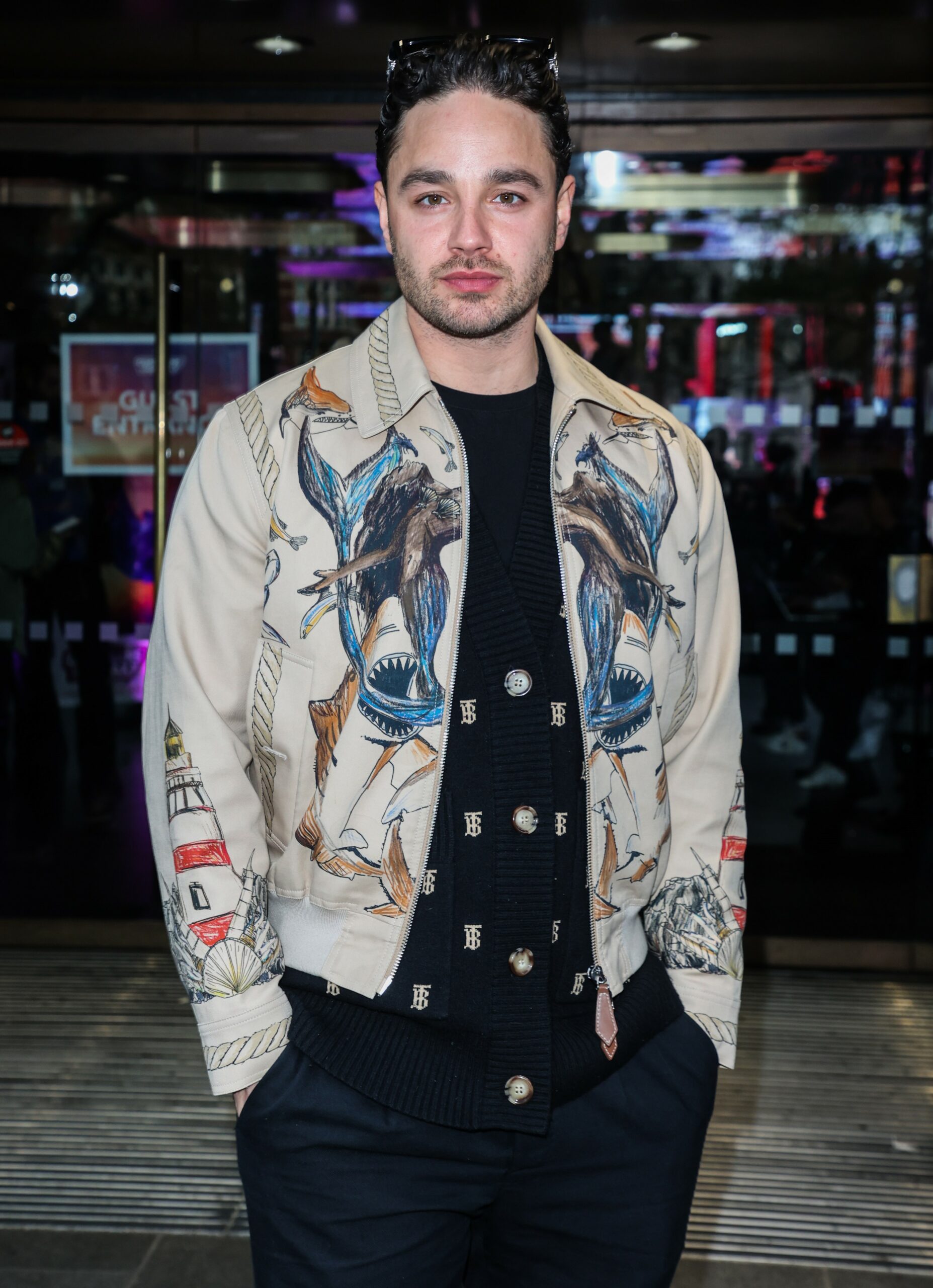 Strictly star Adam Thomas smiling at event