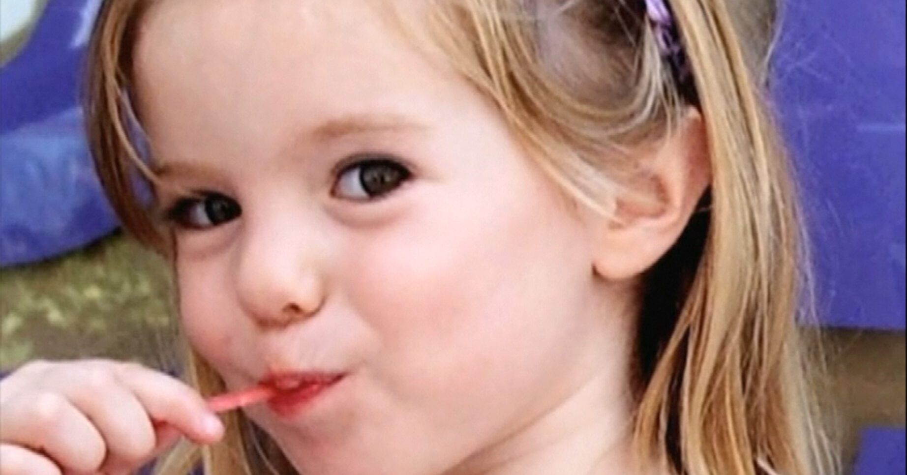 Madeleine McCann sucking a lollipop