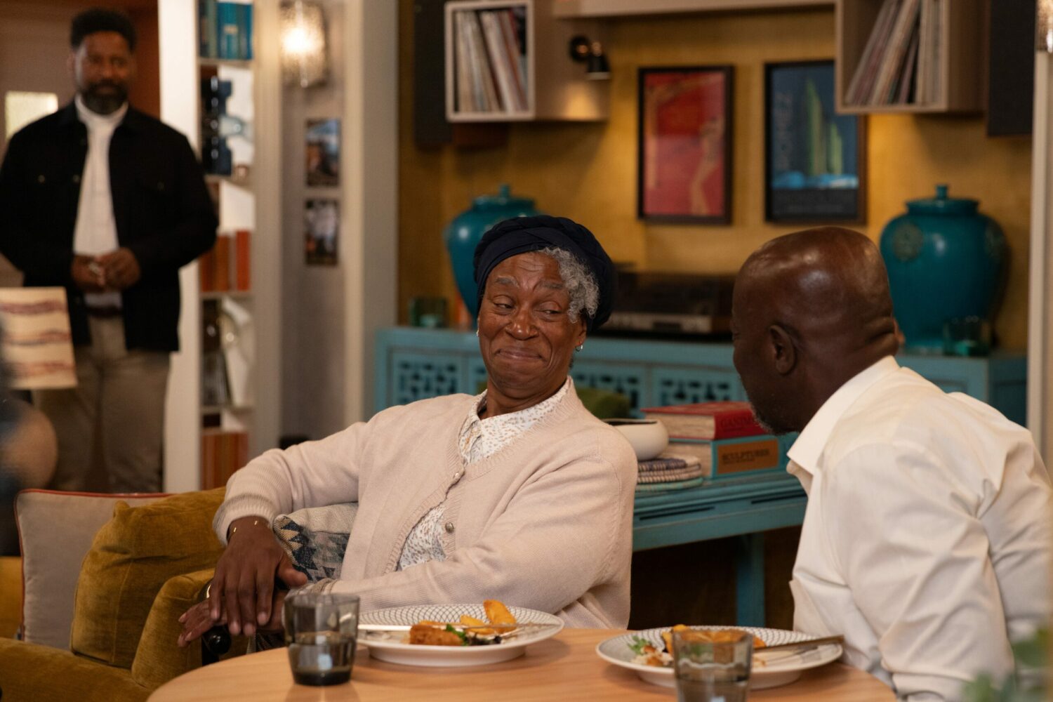 Charles looks on as Claudette and Victor flirt
