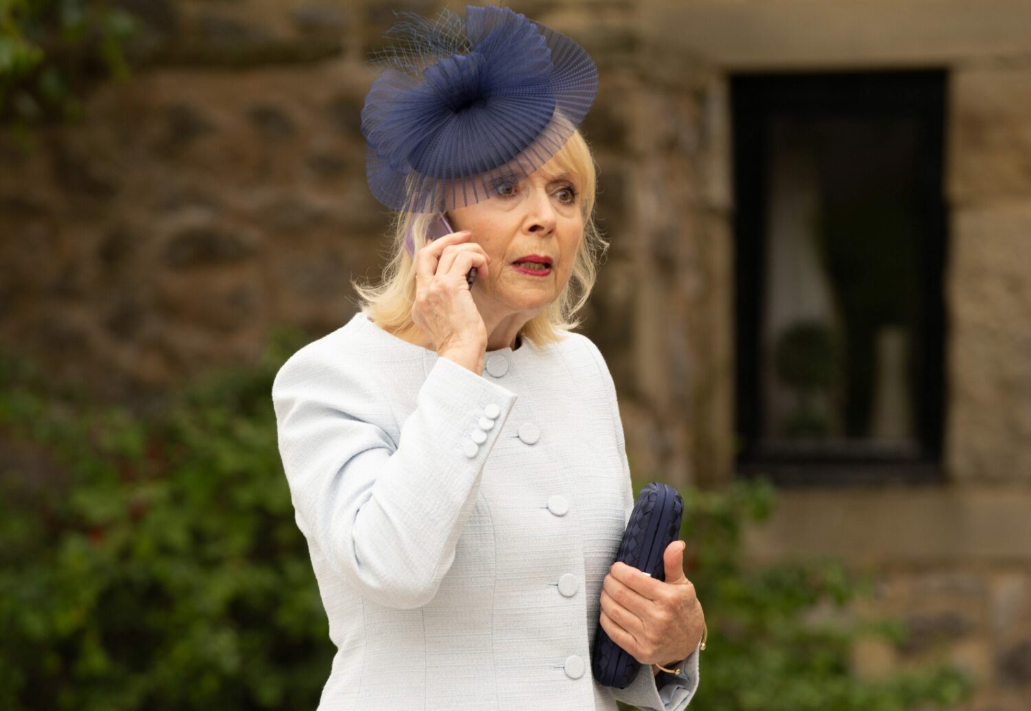 Angry looking Georgia on the phone in Emmerdale