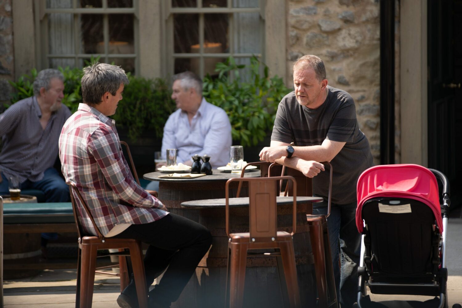 Cain Dingle [JEFF HORDLEY] attempts to lighten the mood with a sombre Dan Spencer [LIAM FOX].<br />