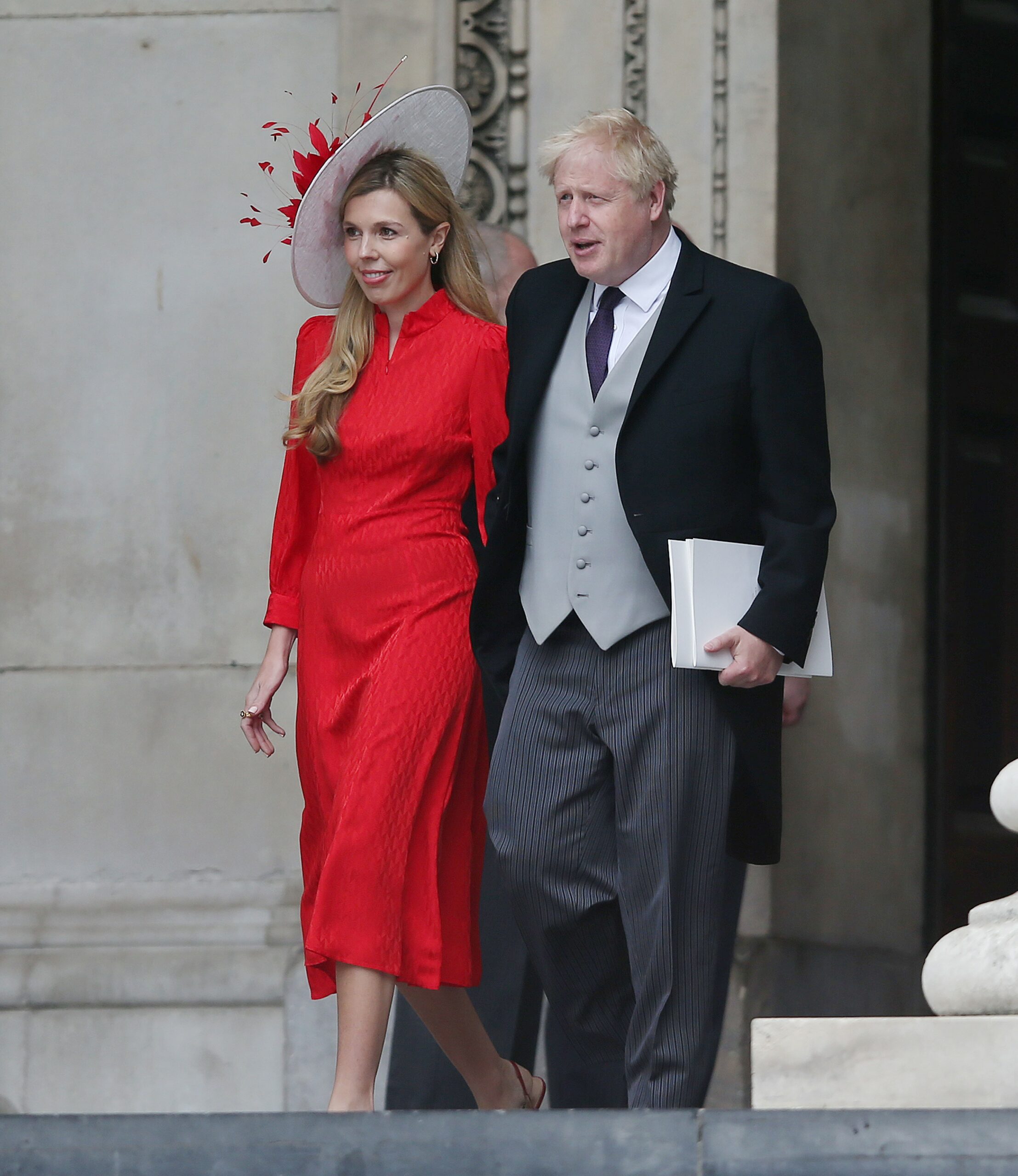 Boris Johnson and Carrie Johnson at service