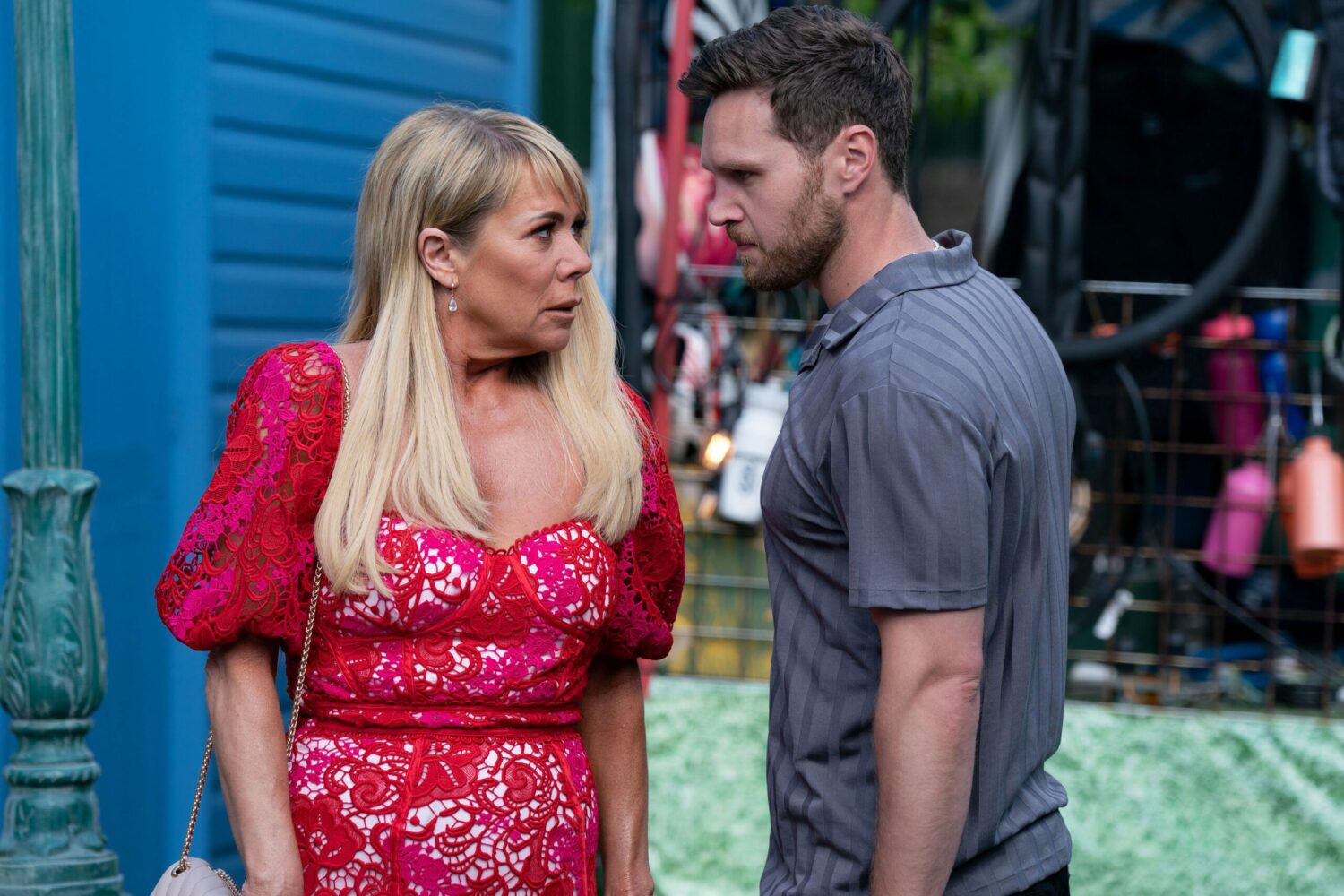 Keanu and Sharon looking angry mid-conversation on EastEnders