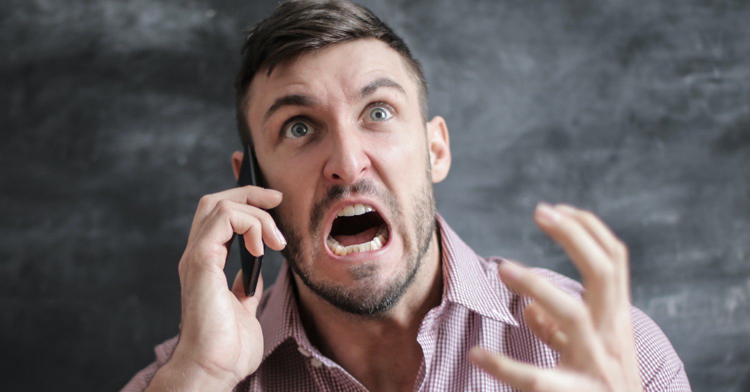 Man angry on the phone