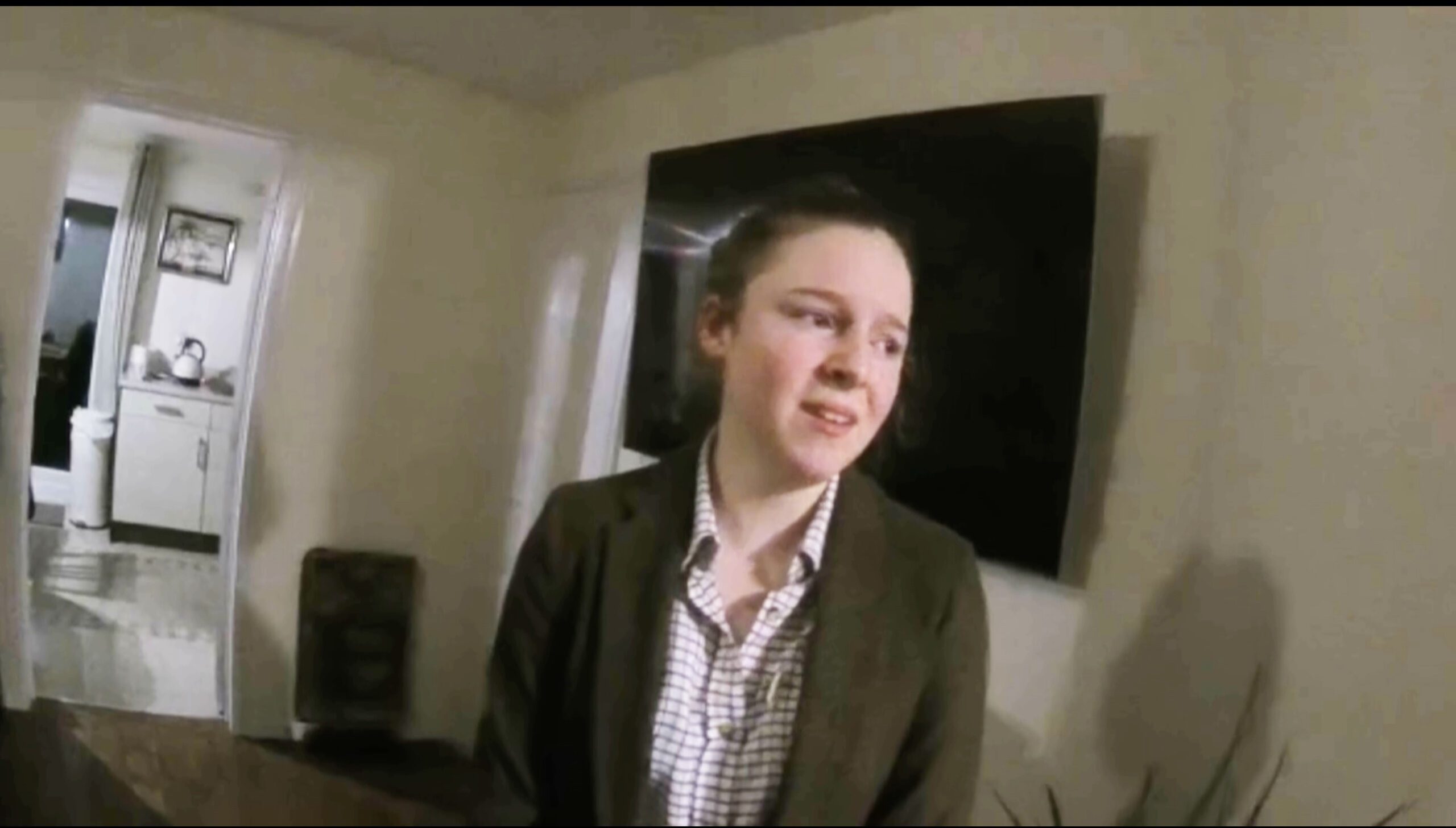 Georgia Hooper in police camera footage after the death of her mum Cheryl