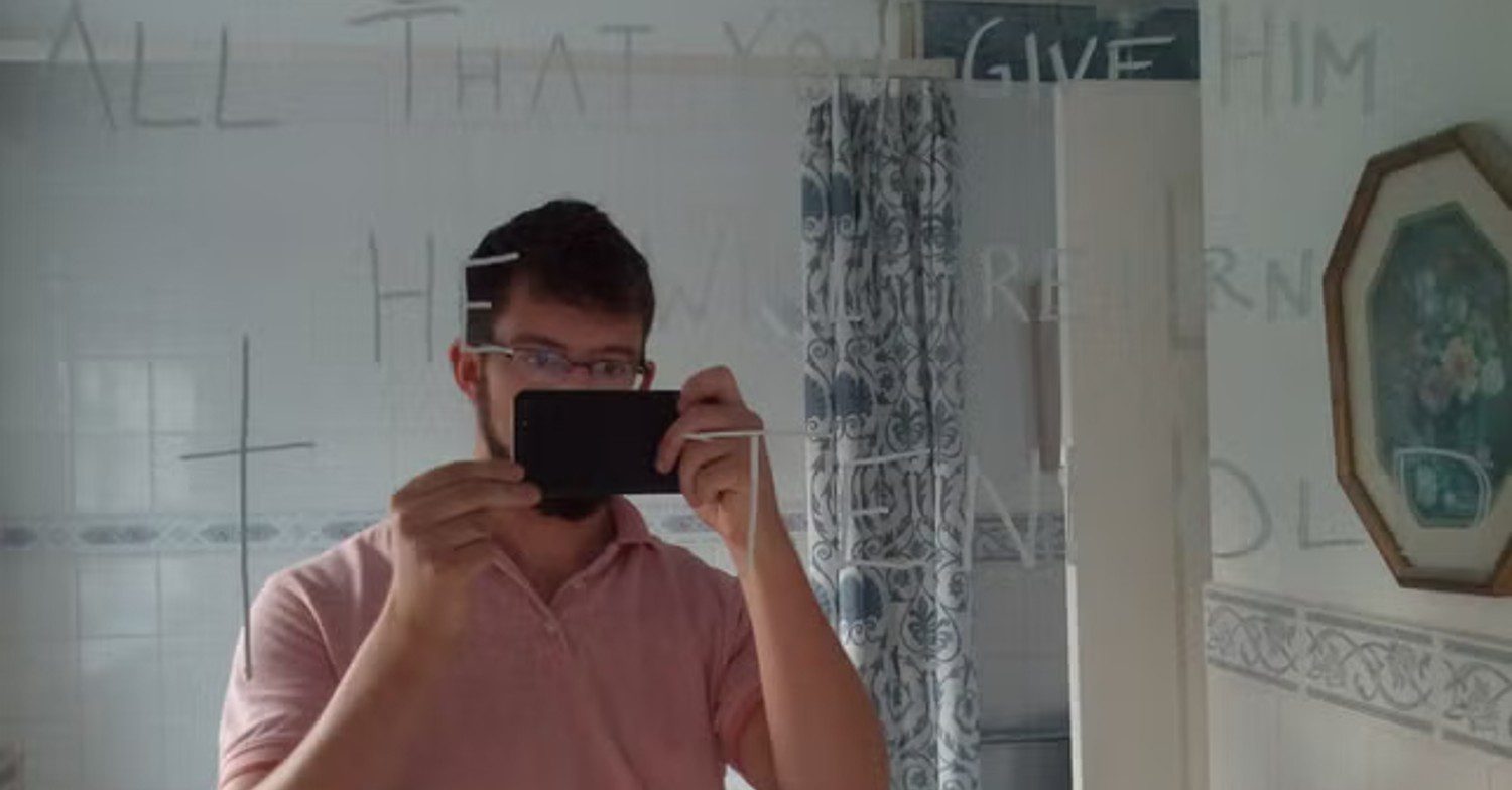 Ben Field taking a picture of himself in the mirror