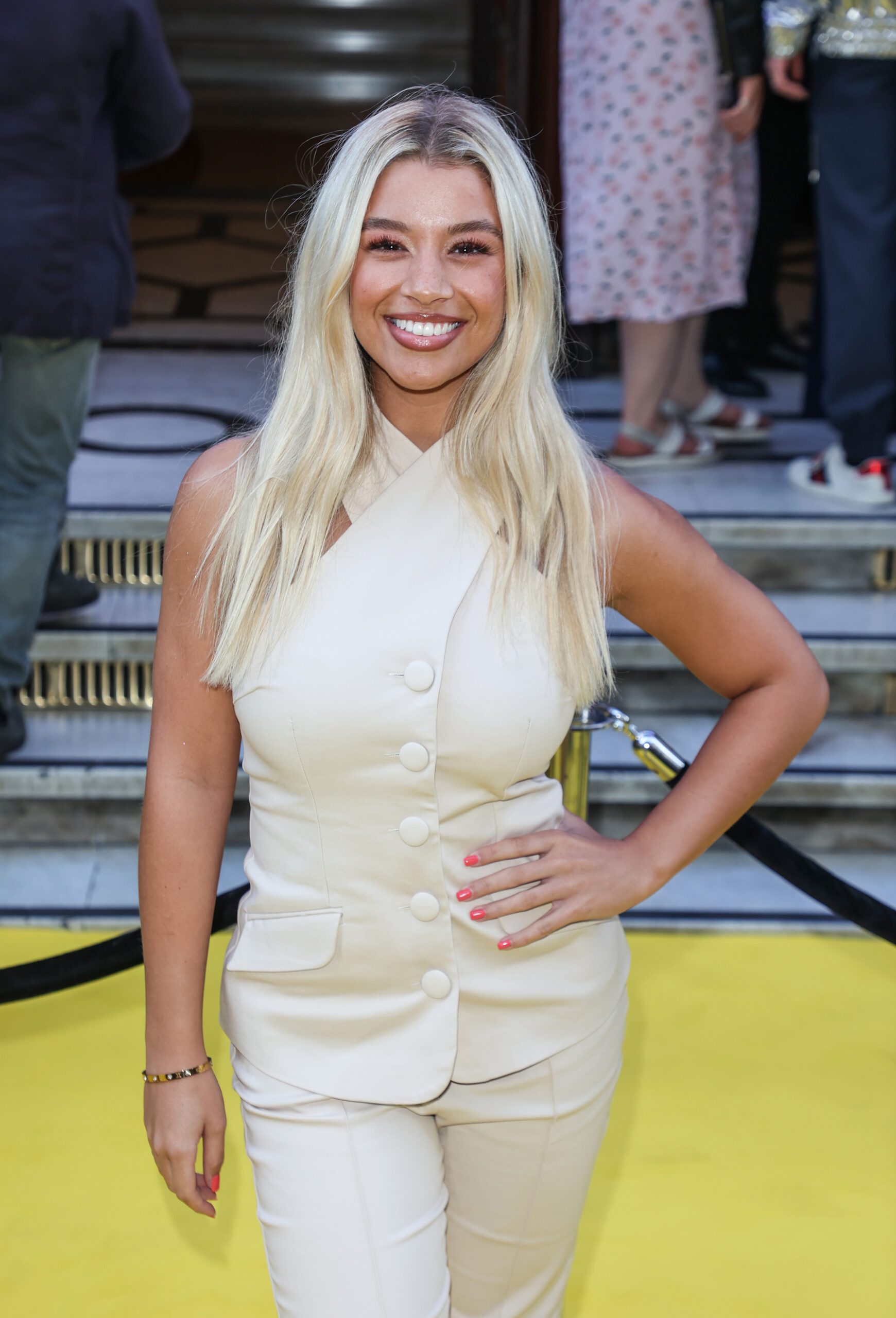 EastEnders star Molly Rainford smiling at event