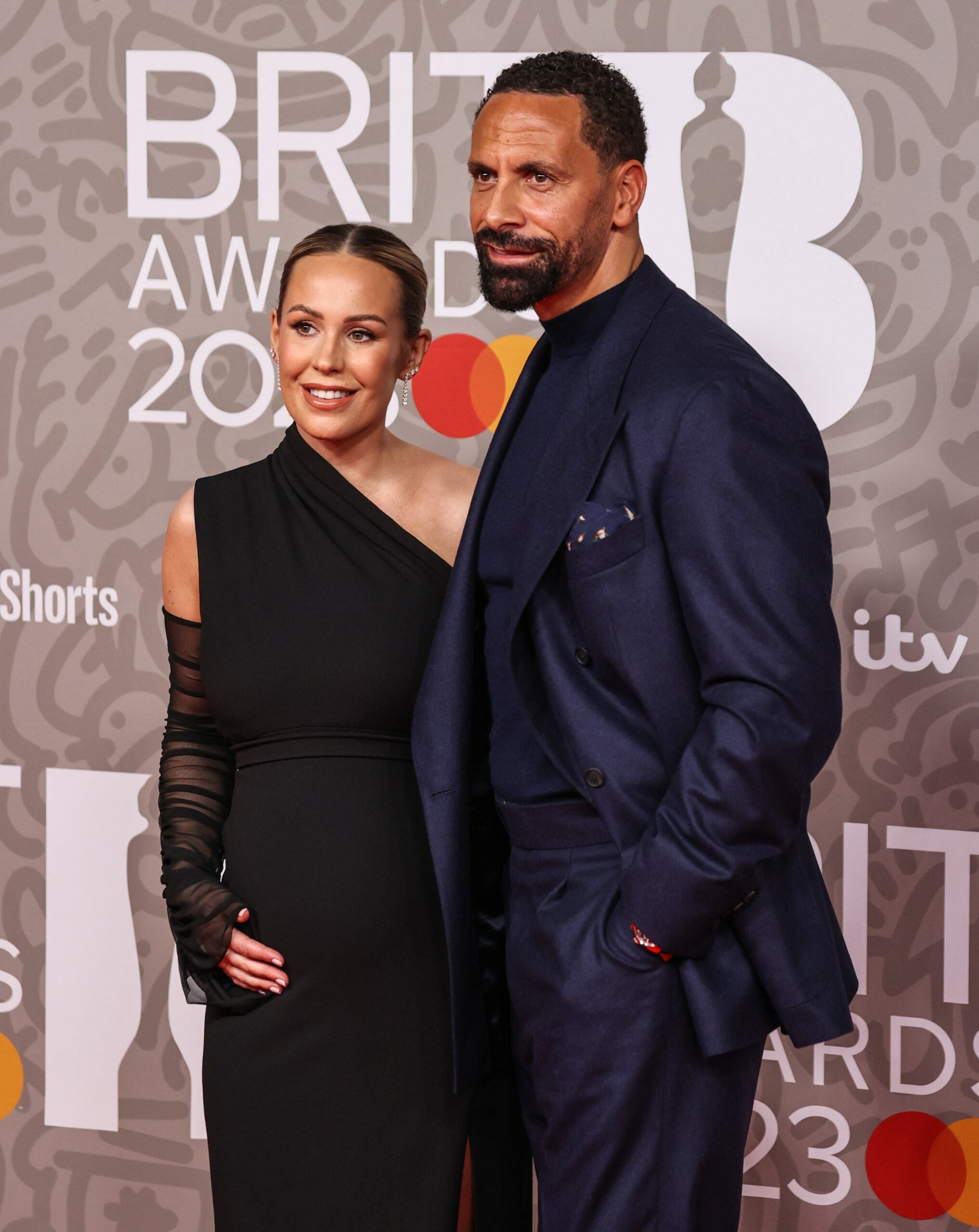 Kate and Rio Ferdinand smiling at BRIT Awards