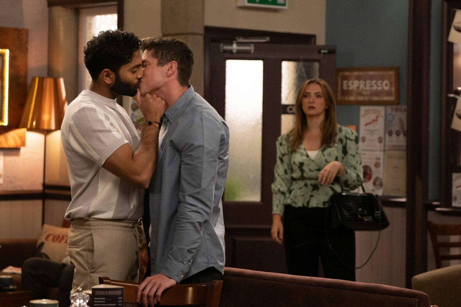 Emmerdale's Suni and Nicky are kissing as Gabby watches on