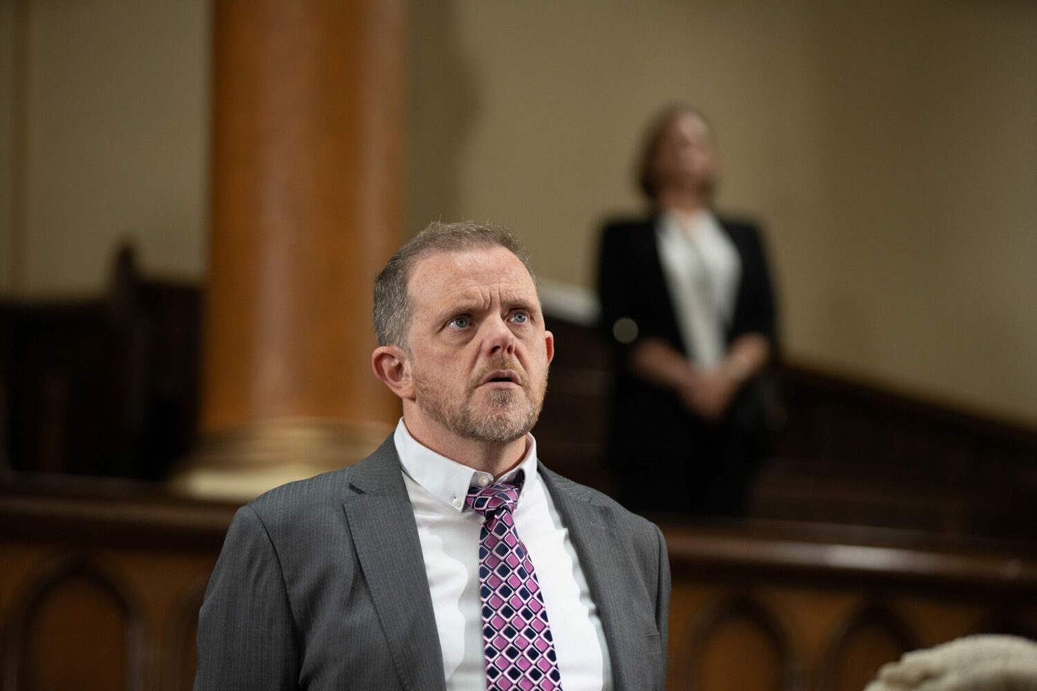 Dan in Emmerdale looks nervous in the dock in court