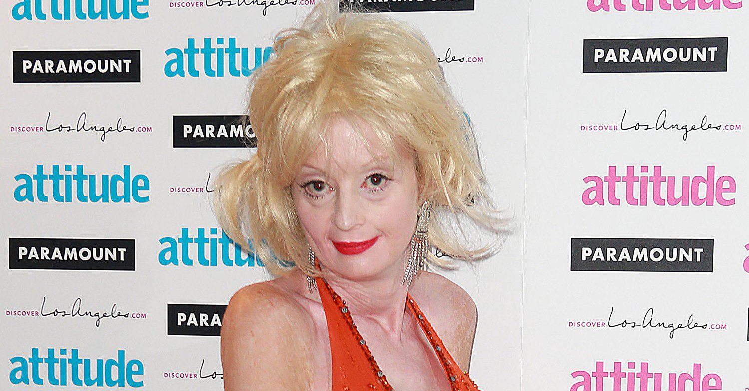 Lauren Harries smiling at a red carpet