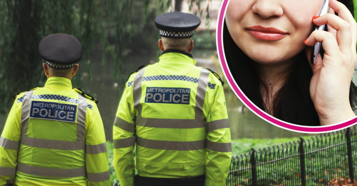 Police officers in uniform with a woman on the phone