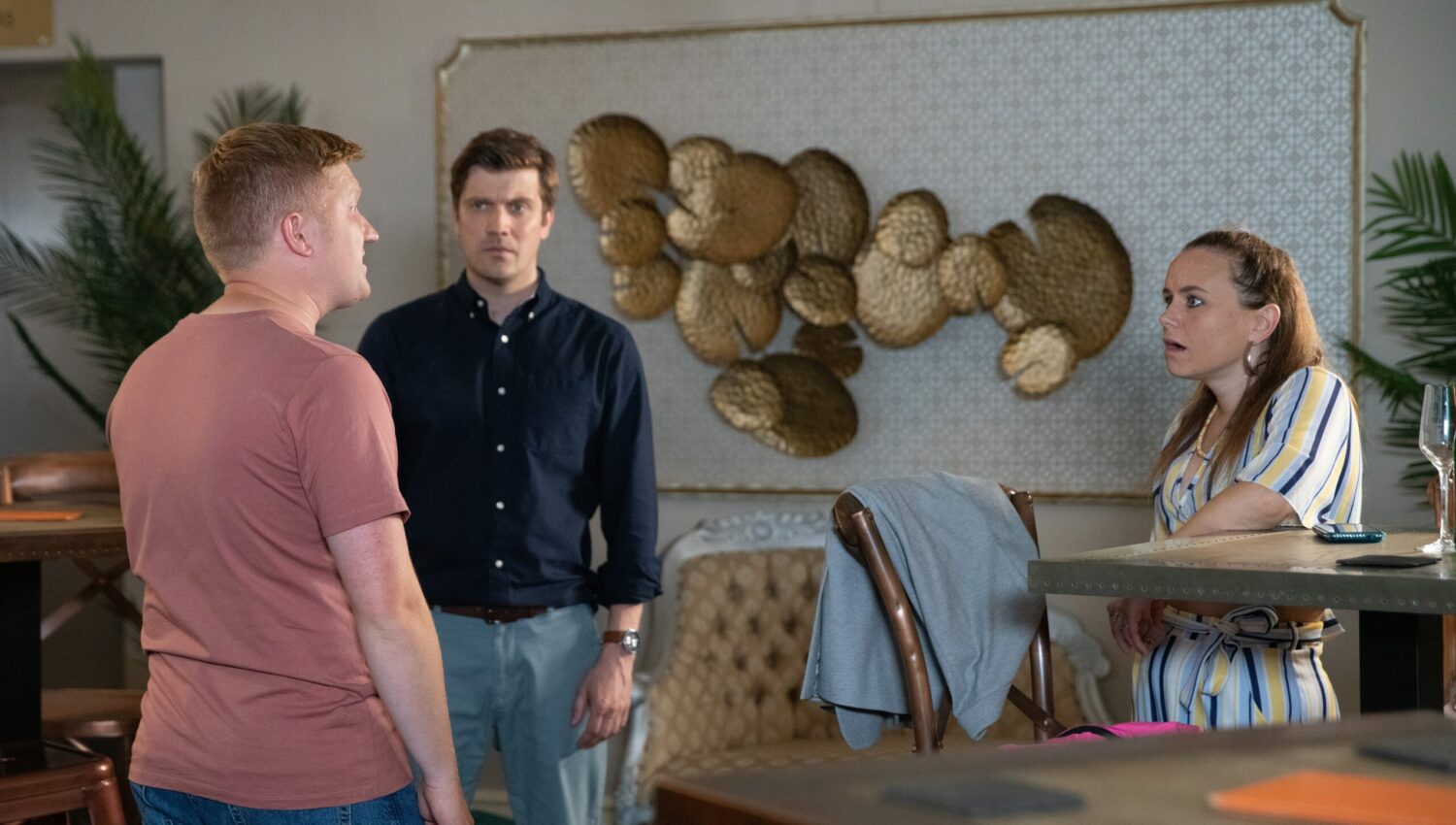Coronation Street's Chesney, Gemma and Henry are having a tense conversation at the hotel