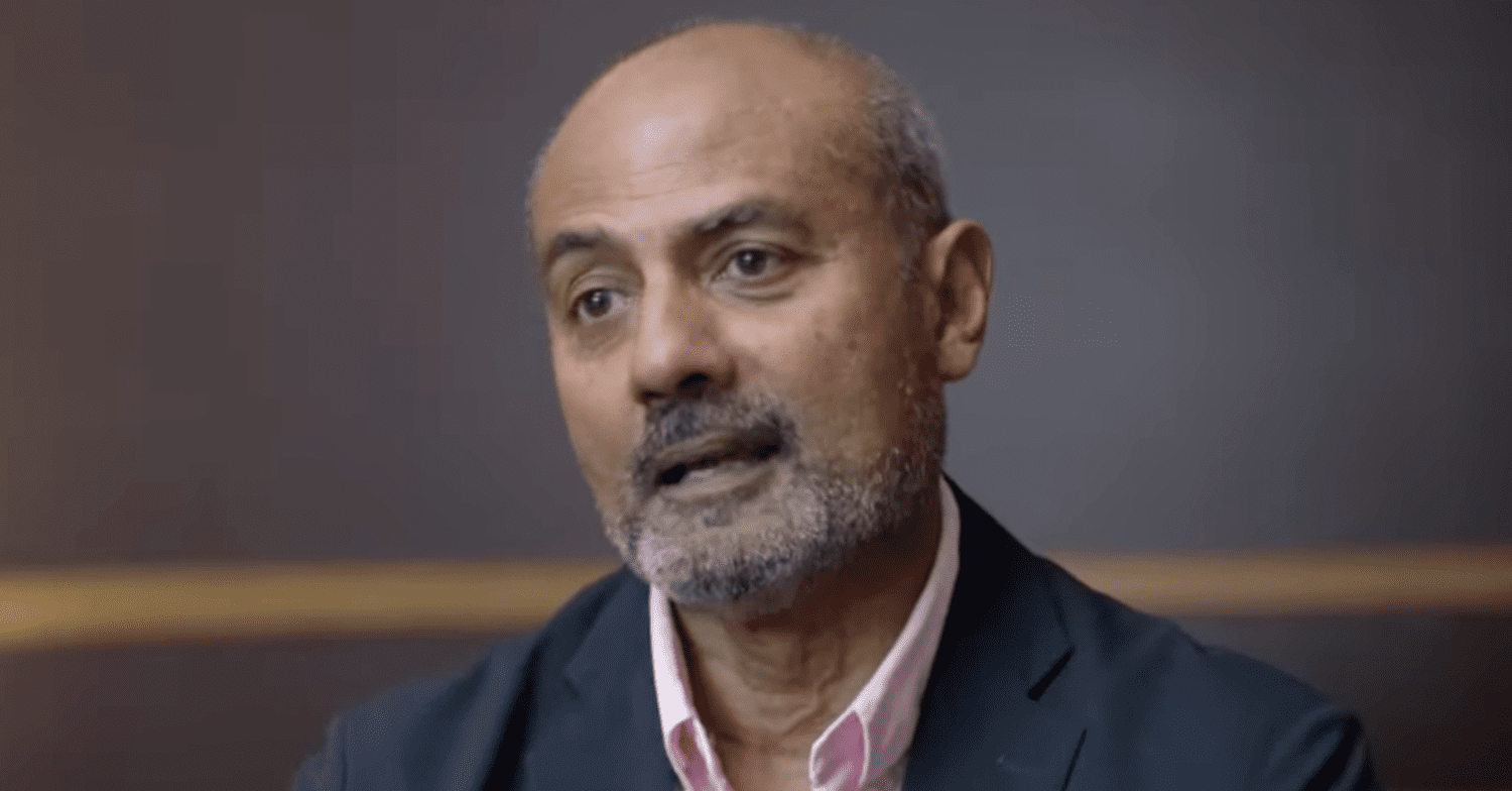 George Alagiah speaking to camera wearing a suit