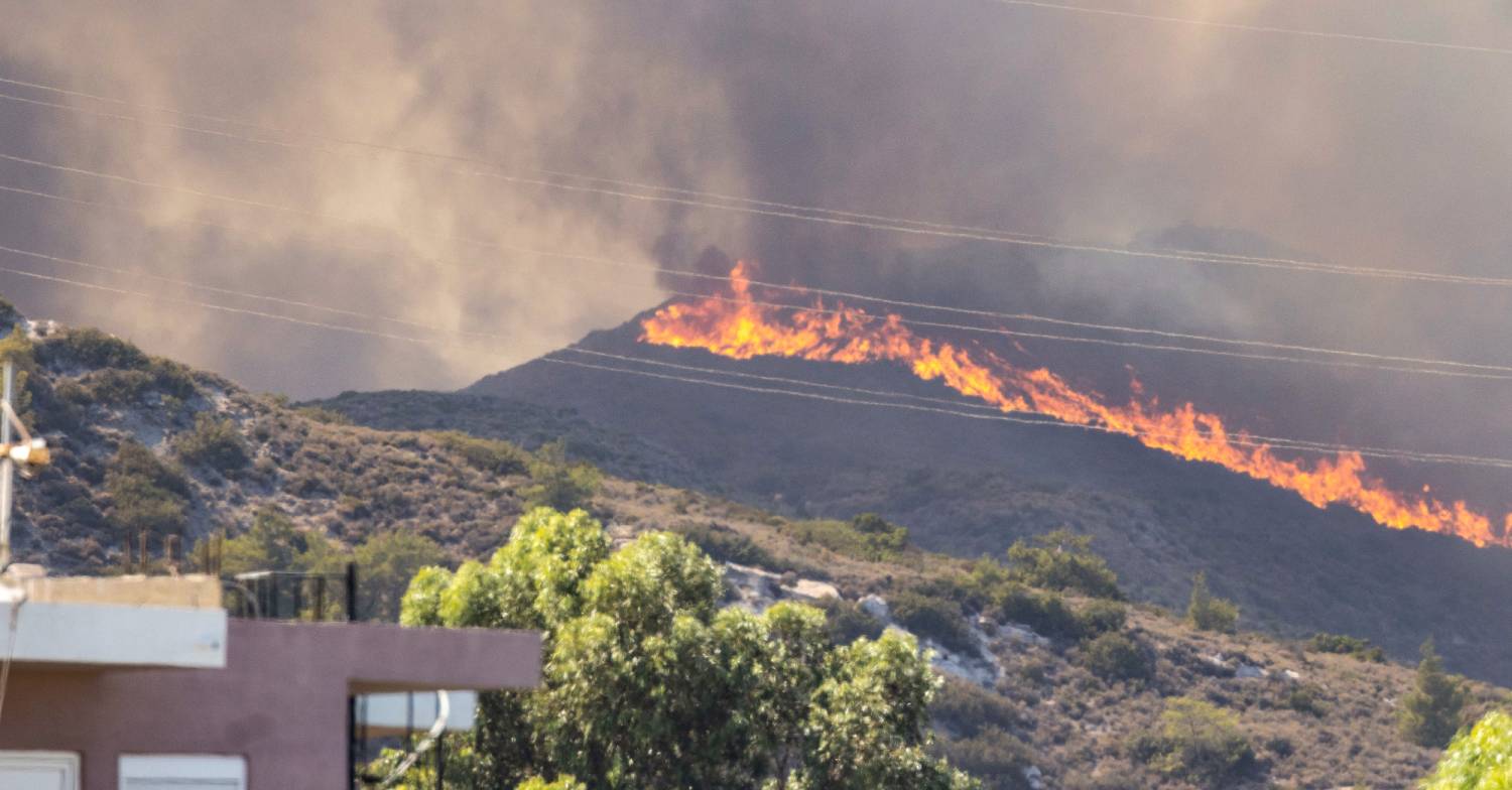A new forest fire breaks out near the village of Gennadi in Greec