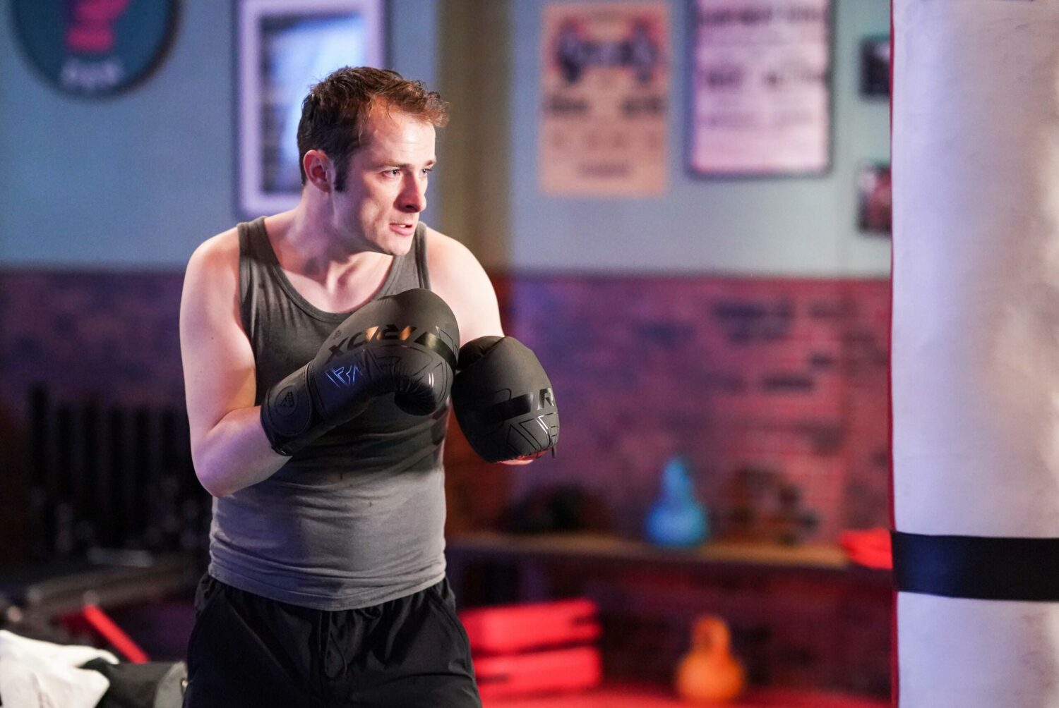 Ben with his boxing gloves on in EastEnders