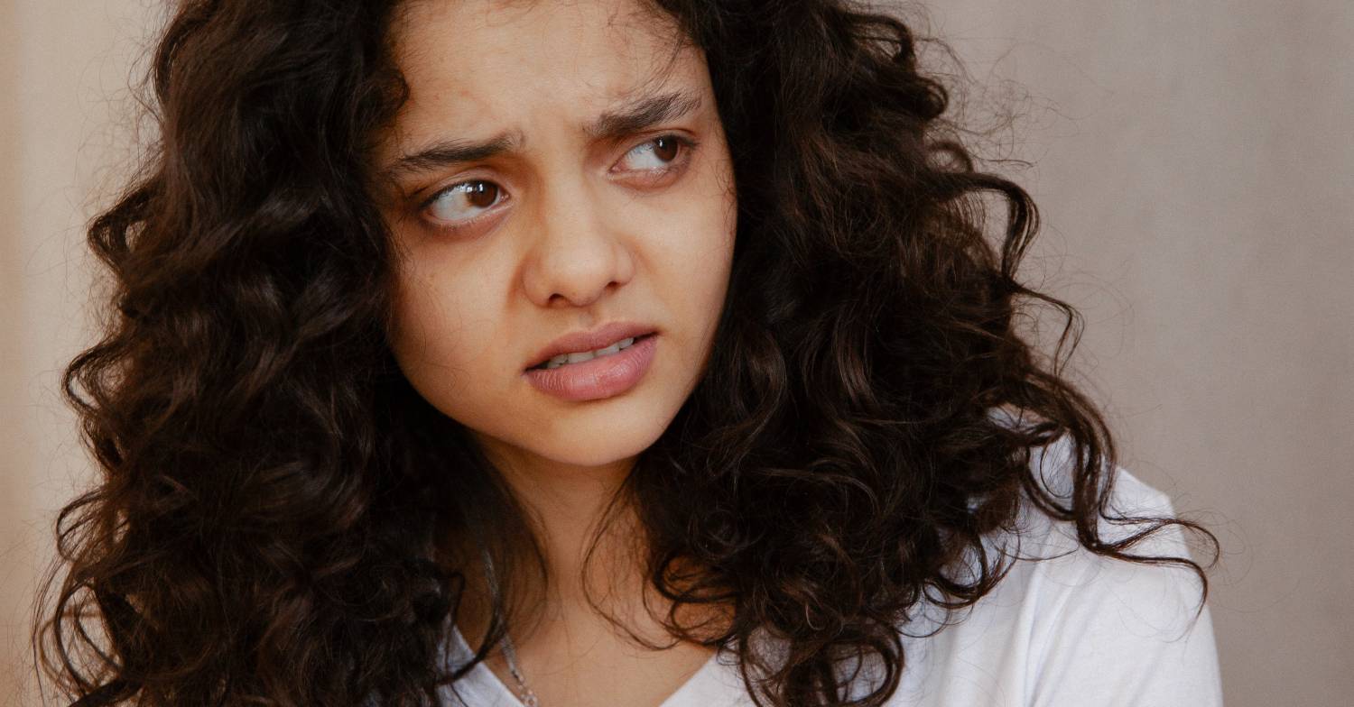 A woman looks appalled