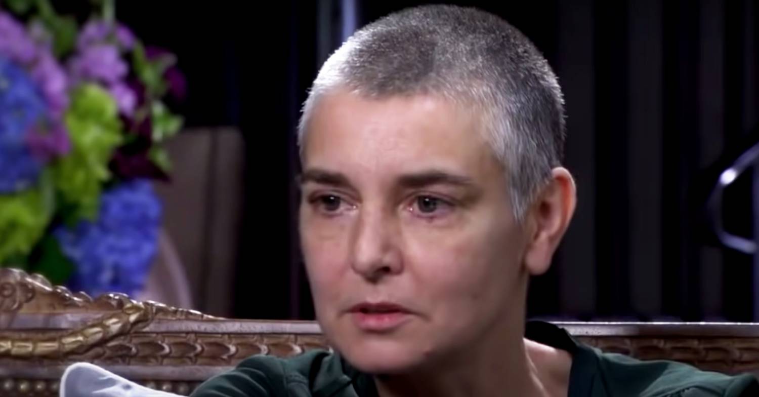 Sinead O'Connor listens during an interview