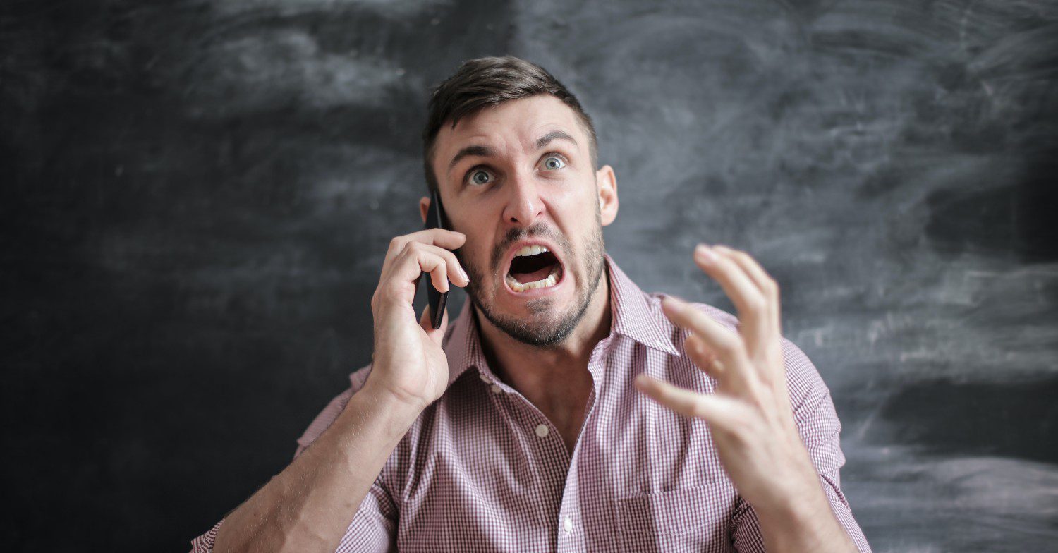 Man angry on the phone 
