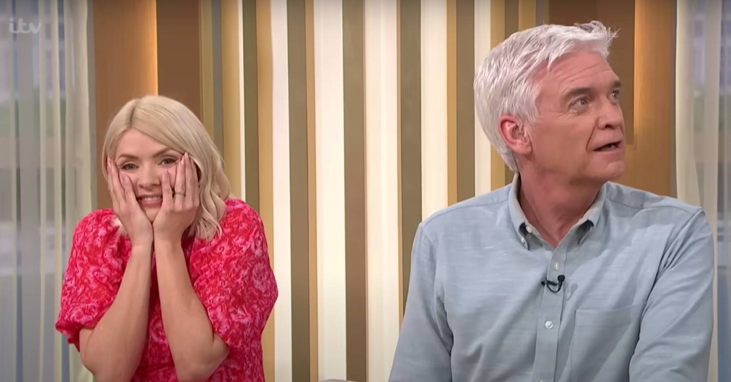 Holly Willoughby holds her face in her hands during Phillip Schofield's last show