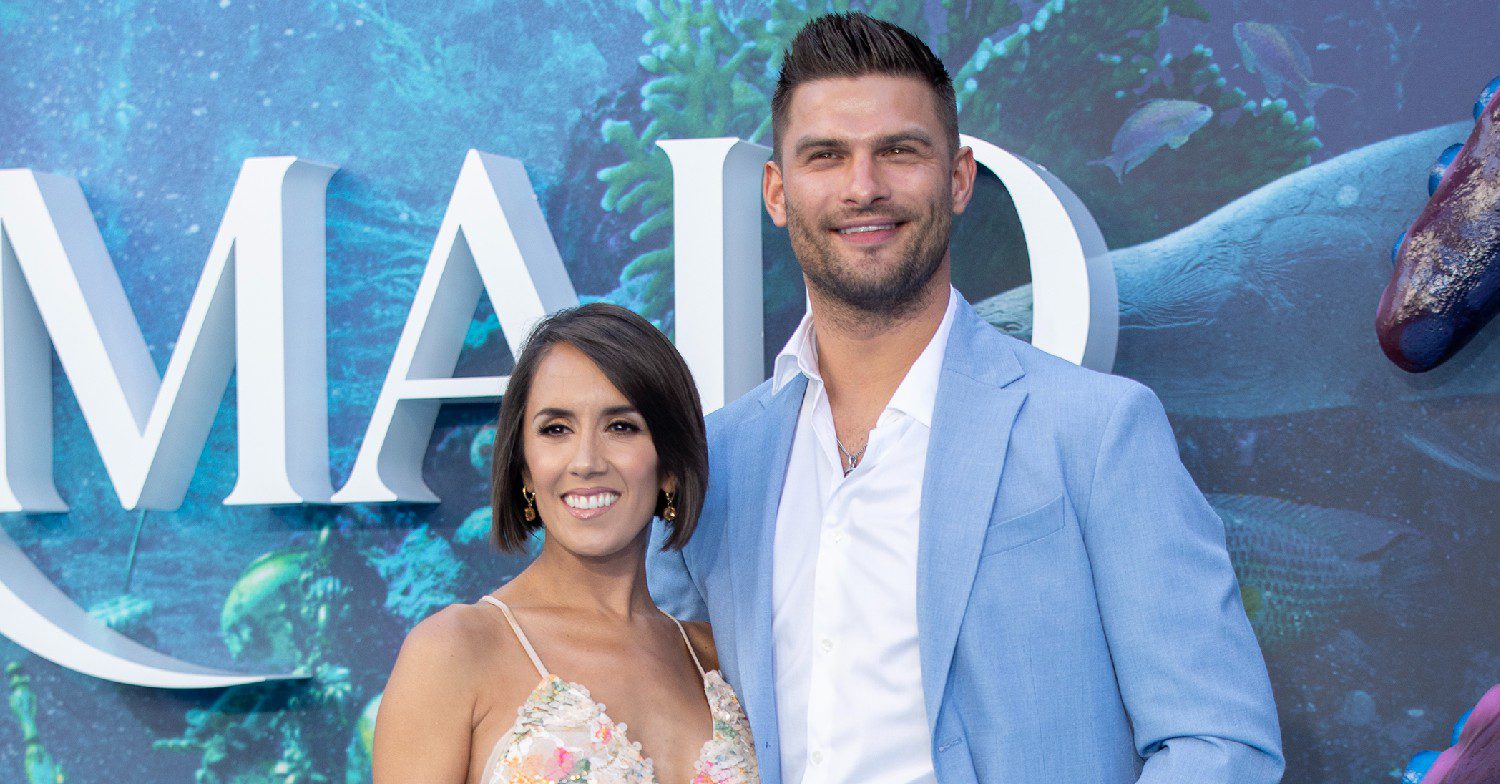Janette Manrara and Aljaz Skorjanec smiling