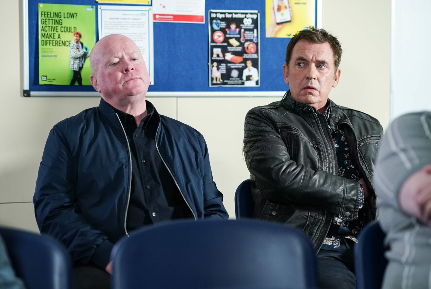 Phil Mitchell accompanies Alfie Moon to the hospital and both look anxious in the waiting room