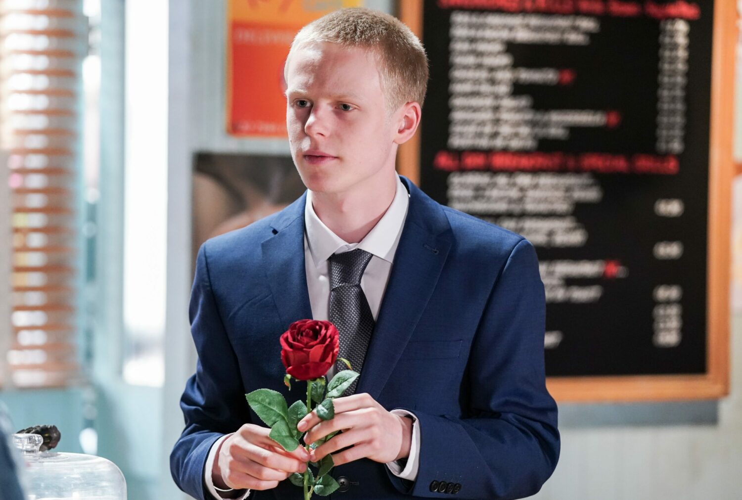EastEnders' Bobby is holding a rose in Kathy's