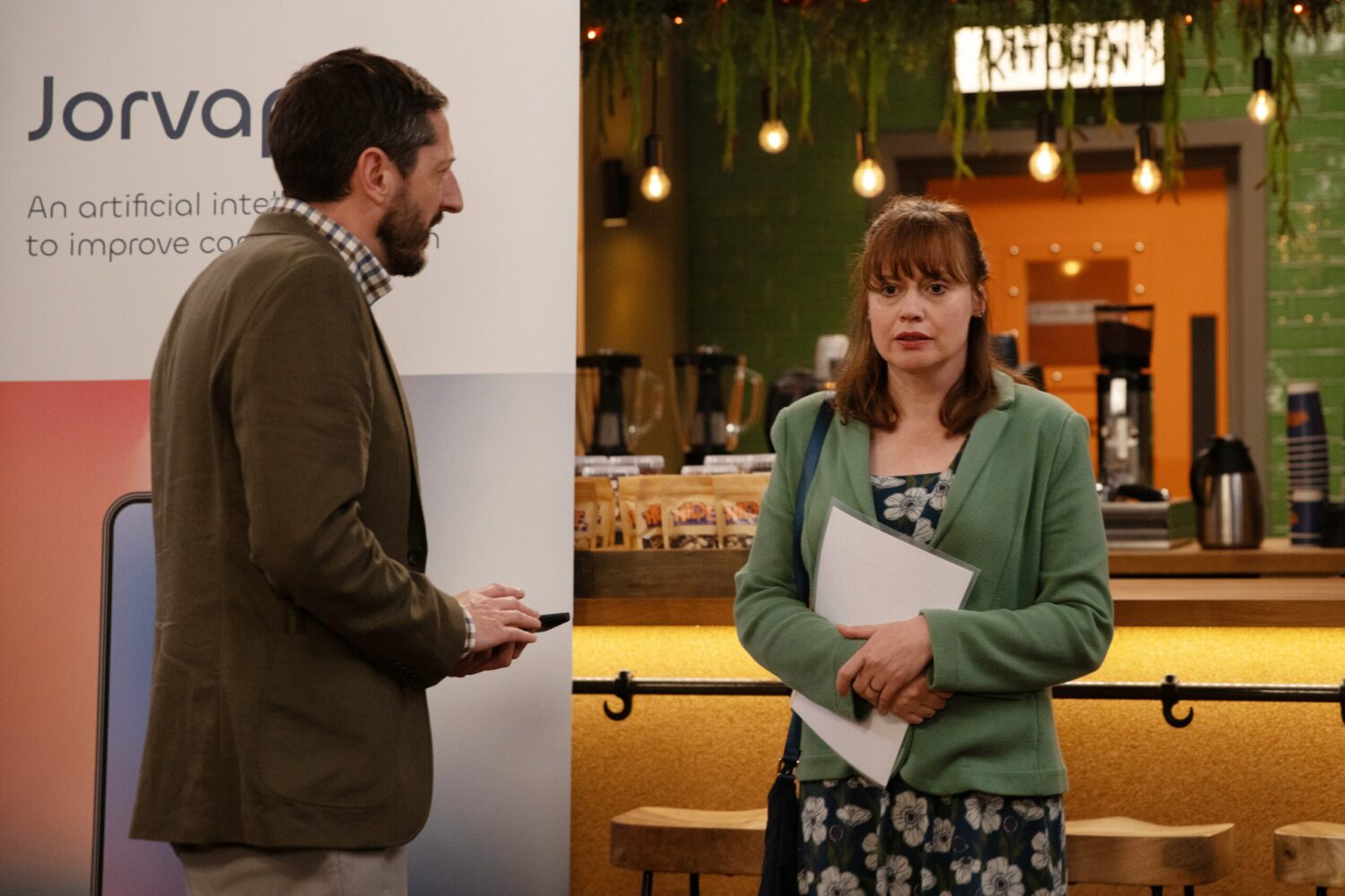 Lydia looks awkward as Craig talks to her on Emmerdale