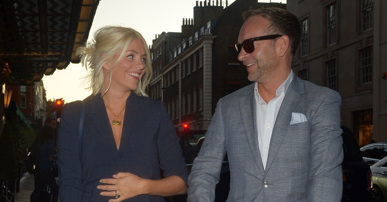 Holly Willoughby and Dan Baldwin smiling at each other