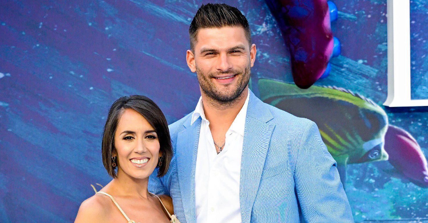 Janette Manrara and Aljaz Skorjanec smiling at event