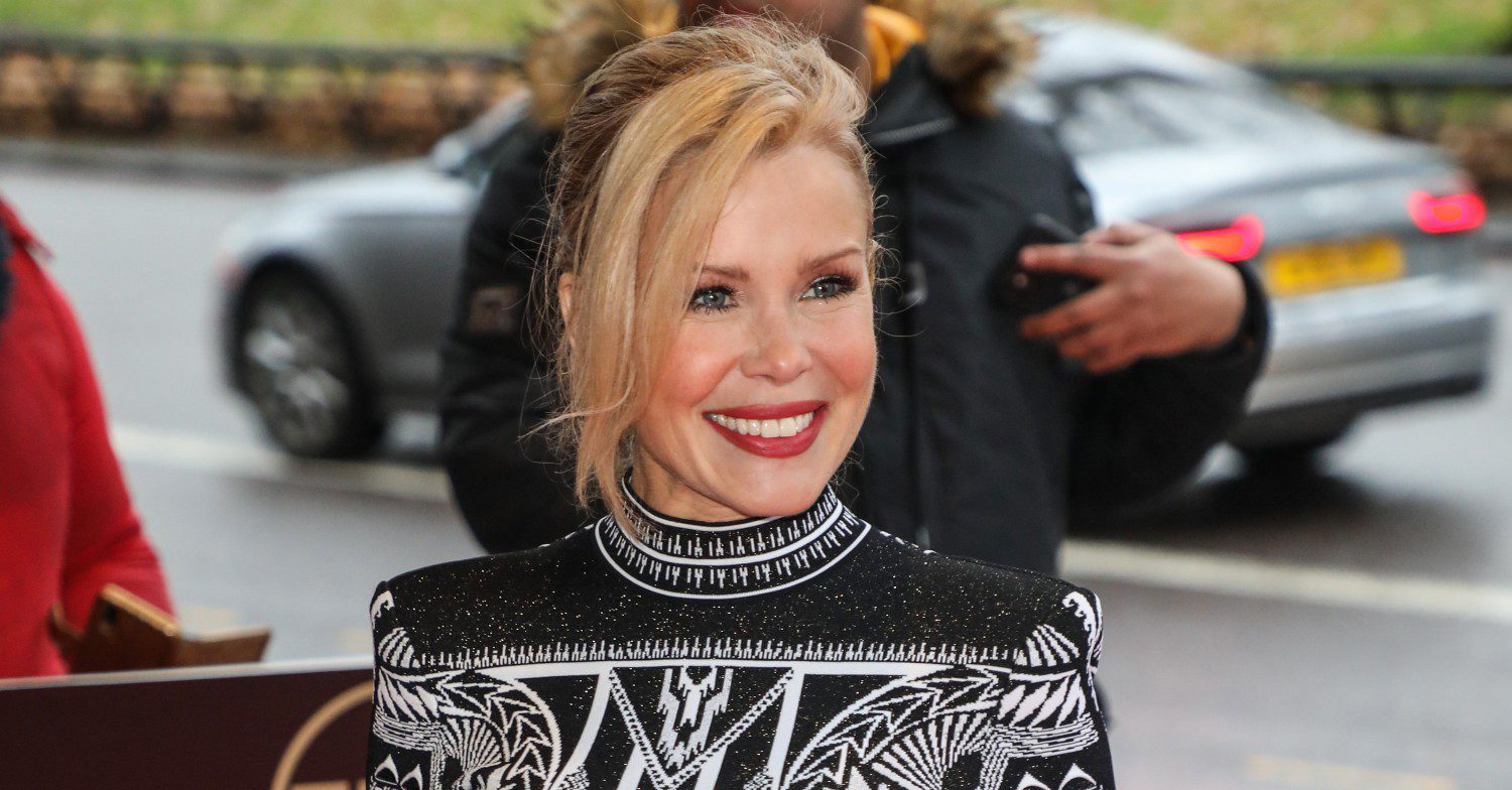 Melinda Messenger smiling on the red carpet