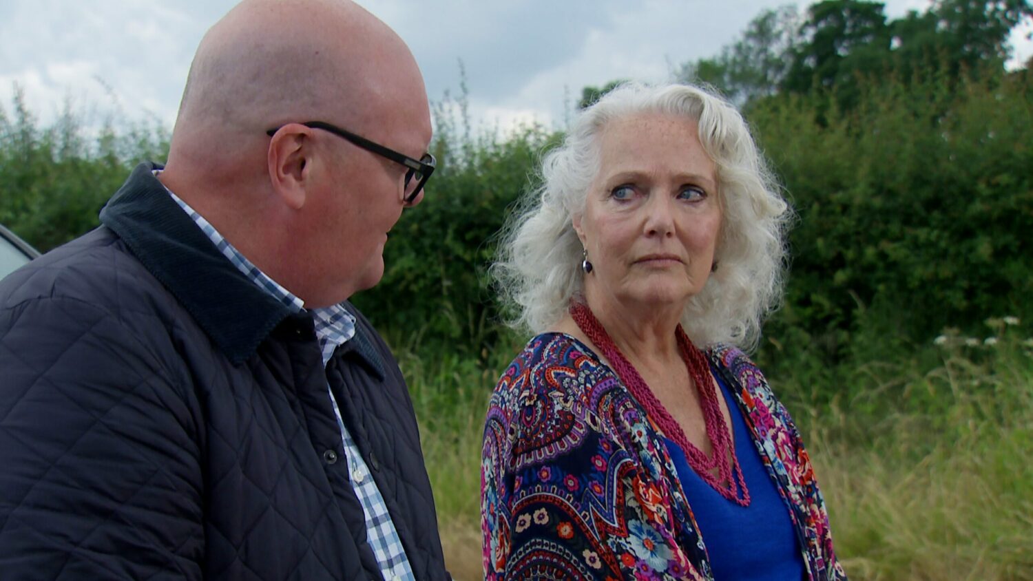 Mary and Paddy are talking outside