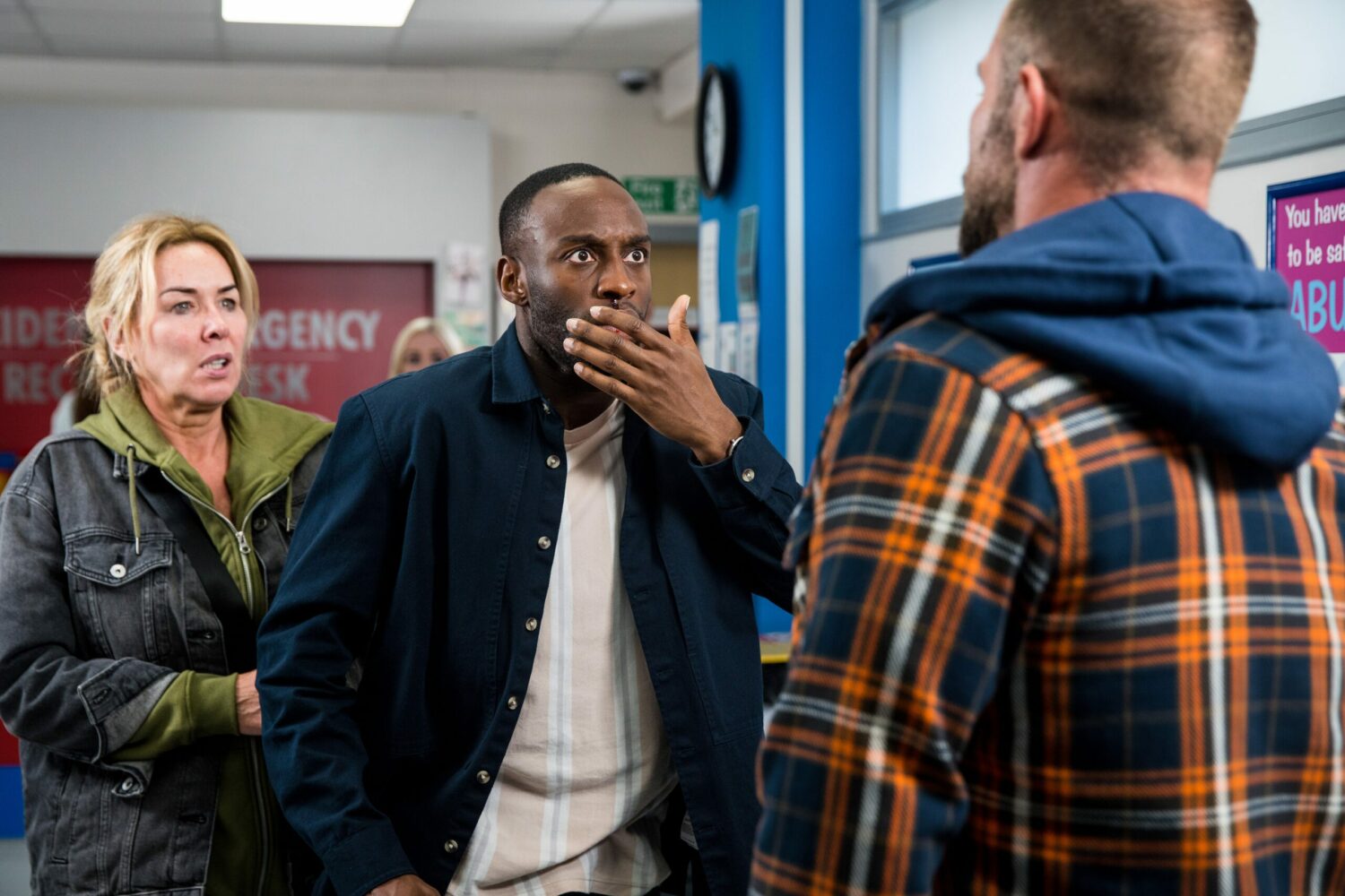 Coronation Street's Michael has his hand to his mouth as Cassie watches on in shock at the hospital