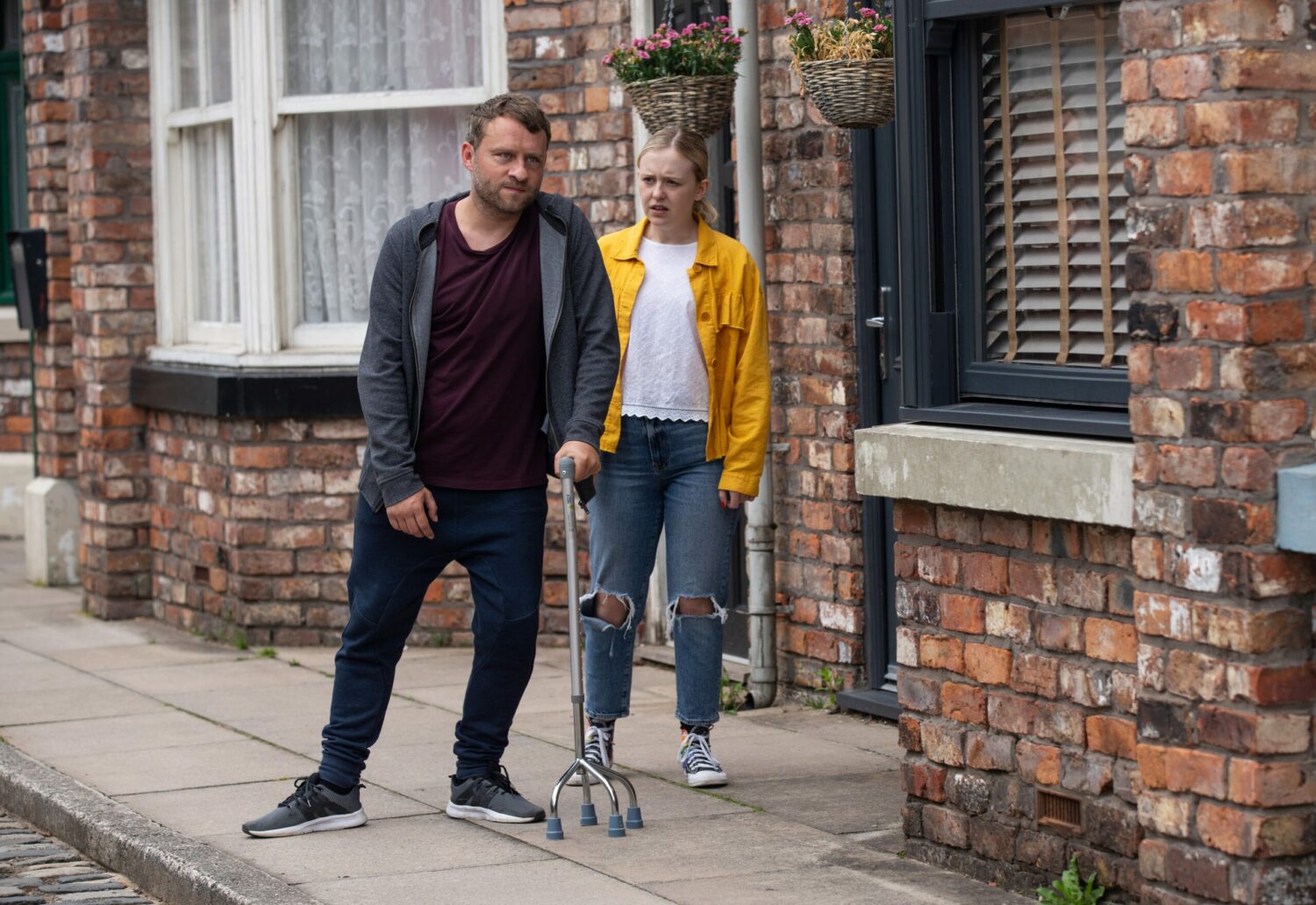 Paul looks fed-up as he leans on a walking aid and Summer pleads with him in Coronation Street