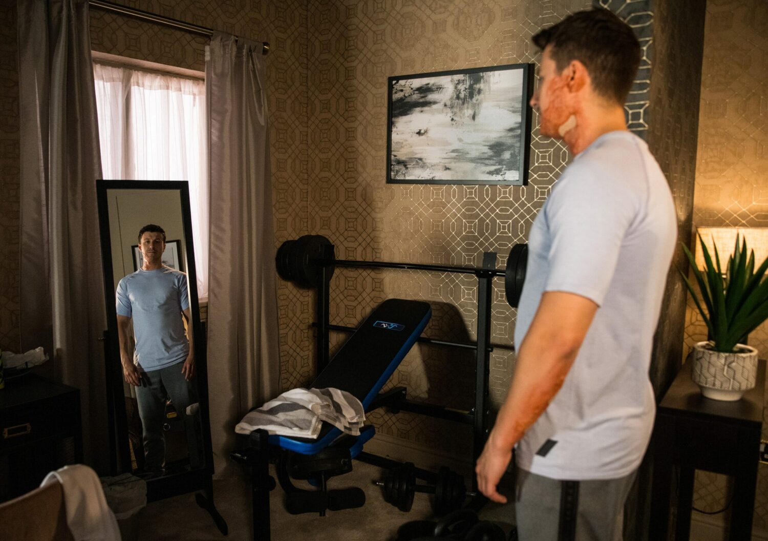 Forlorn Ryan looks in the mirror at his body in Coronation Steet spoilers