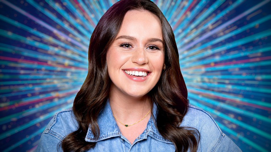 Ellie Leach smiling against a Strictly background