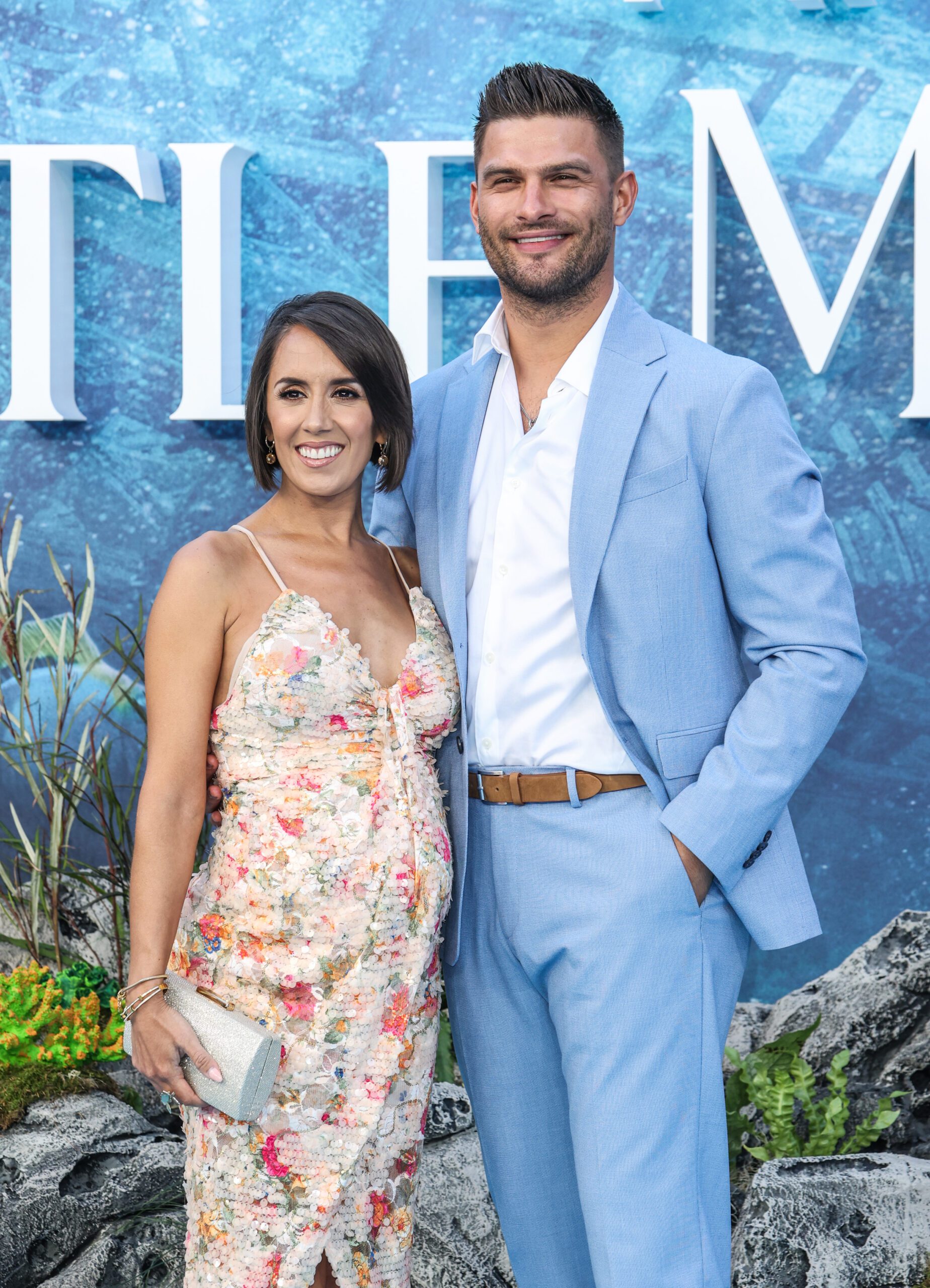 Janette Manrara and Aljaz Skorjanec smiling at premiere