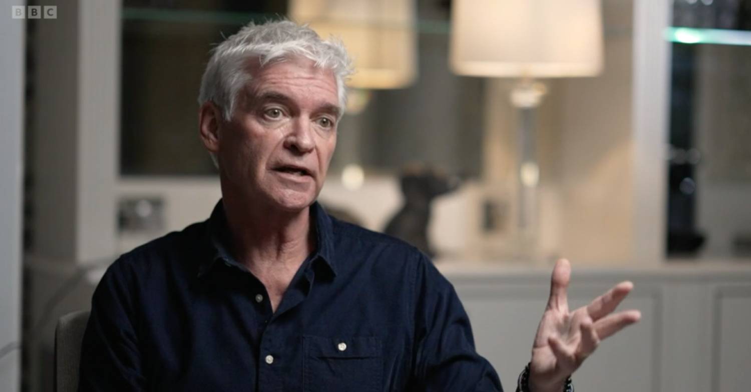 Phillip Schofield gestures with his hand