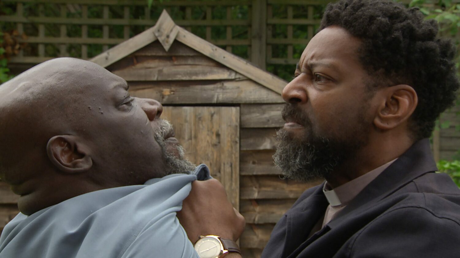 Emmerdale's Charles is grabbing Victor by the collar