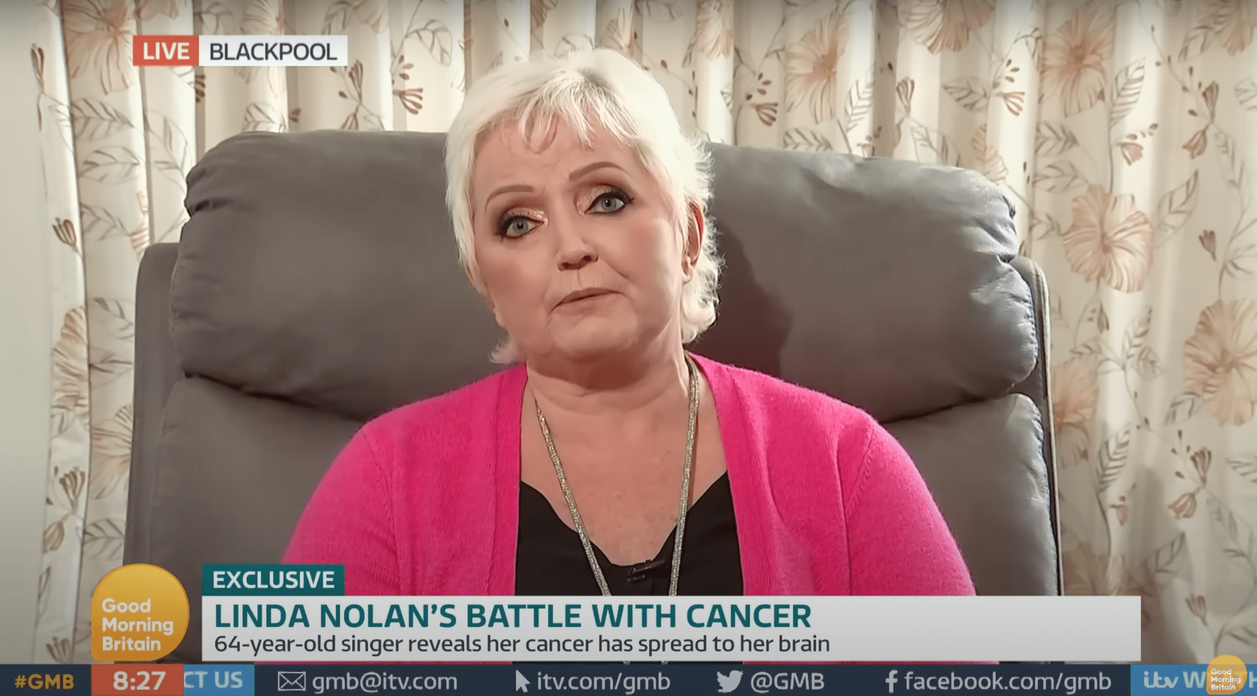 Linda Nolan speaking on GMB wearing a pink top