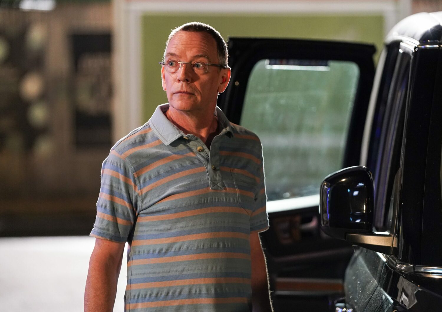 Ian getting out of a taxi in EastEnders