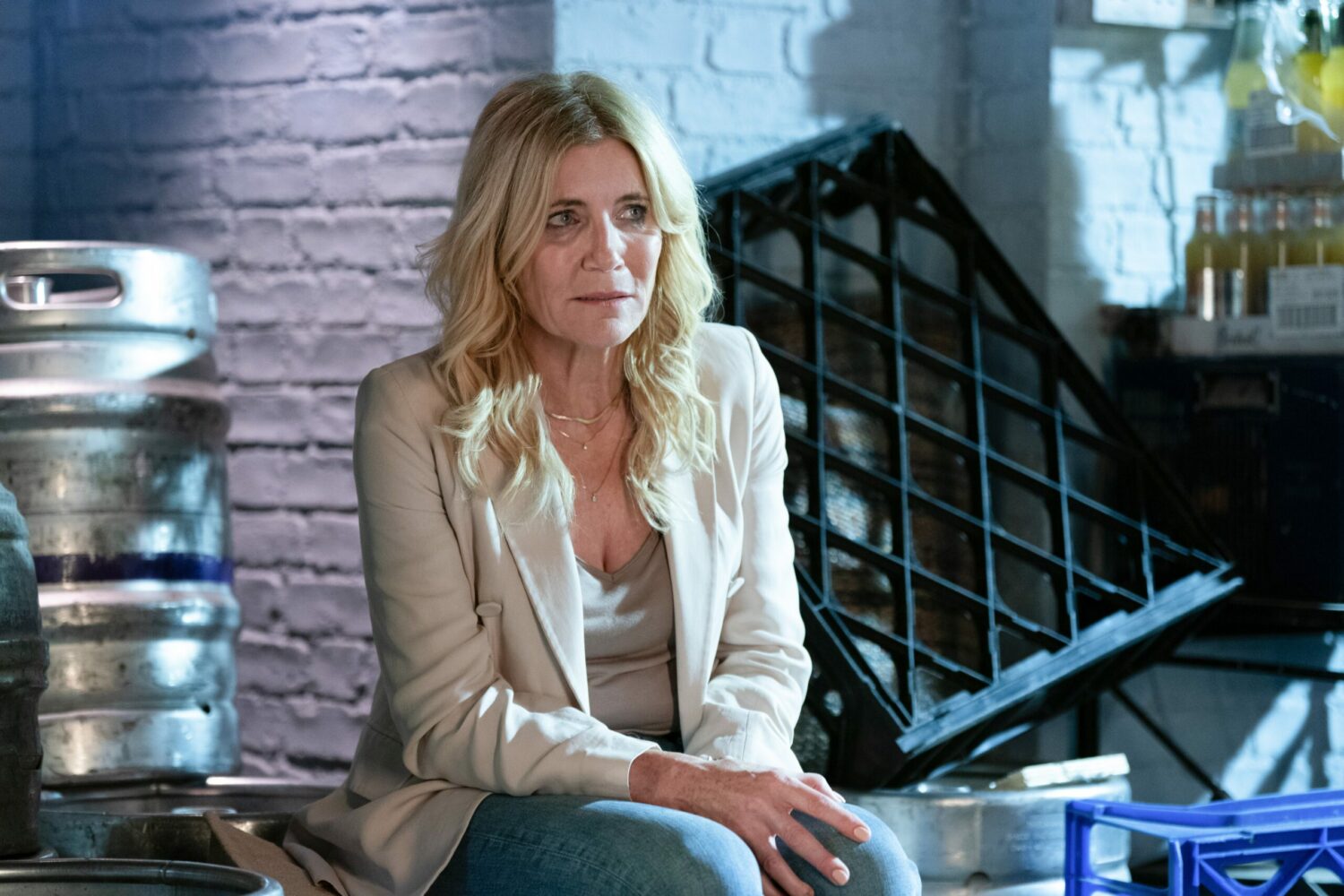 Cindy talking to George in the barrel store