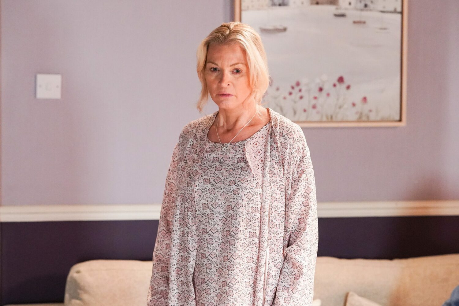 Sharon looks shocked on EastEnders