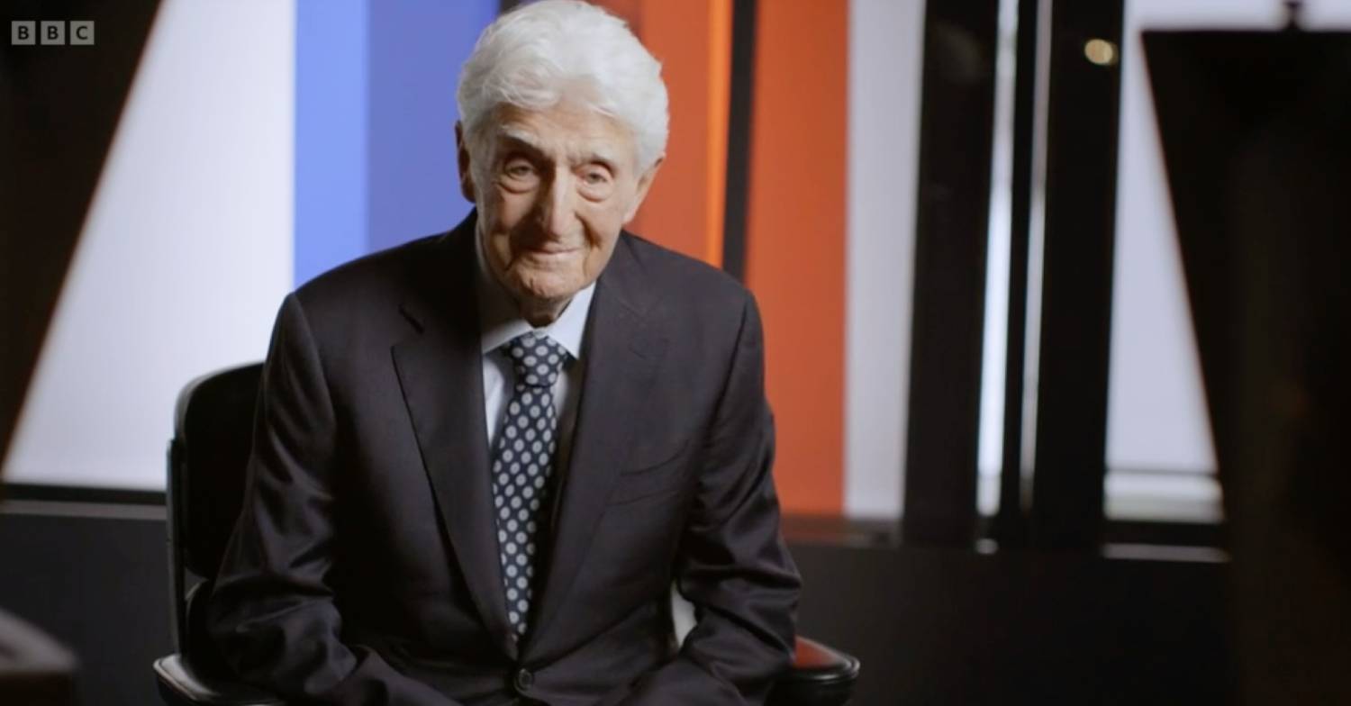 Michael Parkinson smiles to camera