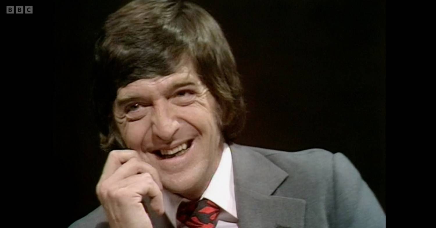 Michael Parkinson laughs during an interview