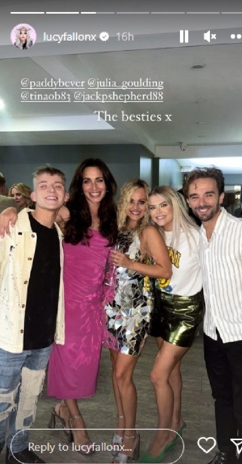 Lucy Fallon smiles with Coronation Street co-stars