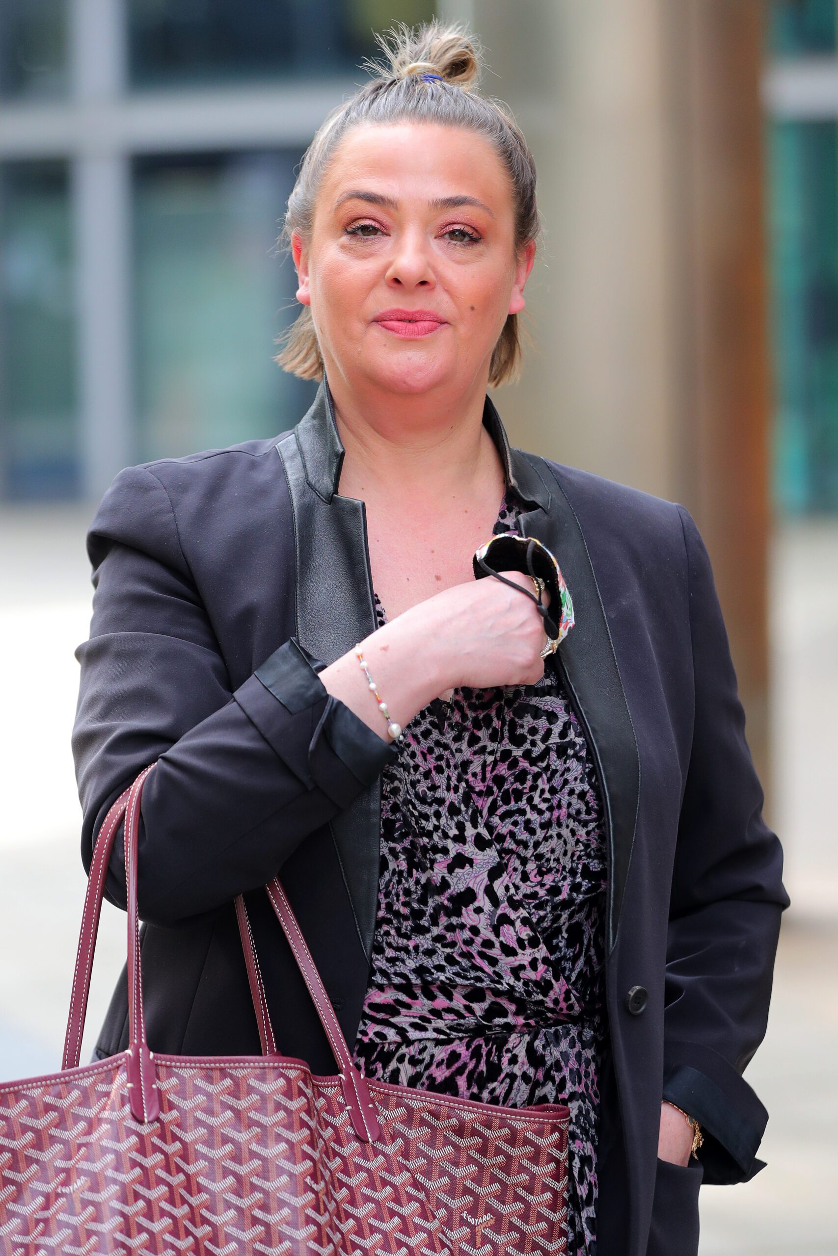 Lisa Armstrong walking down the street