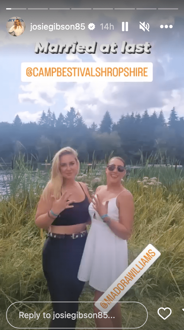 Josie Gibson in a field showing off her 'wedding' ring