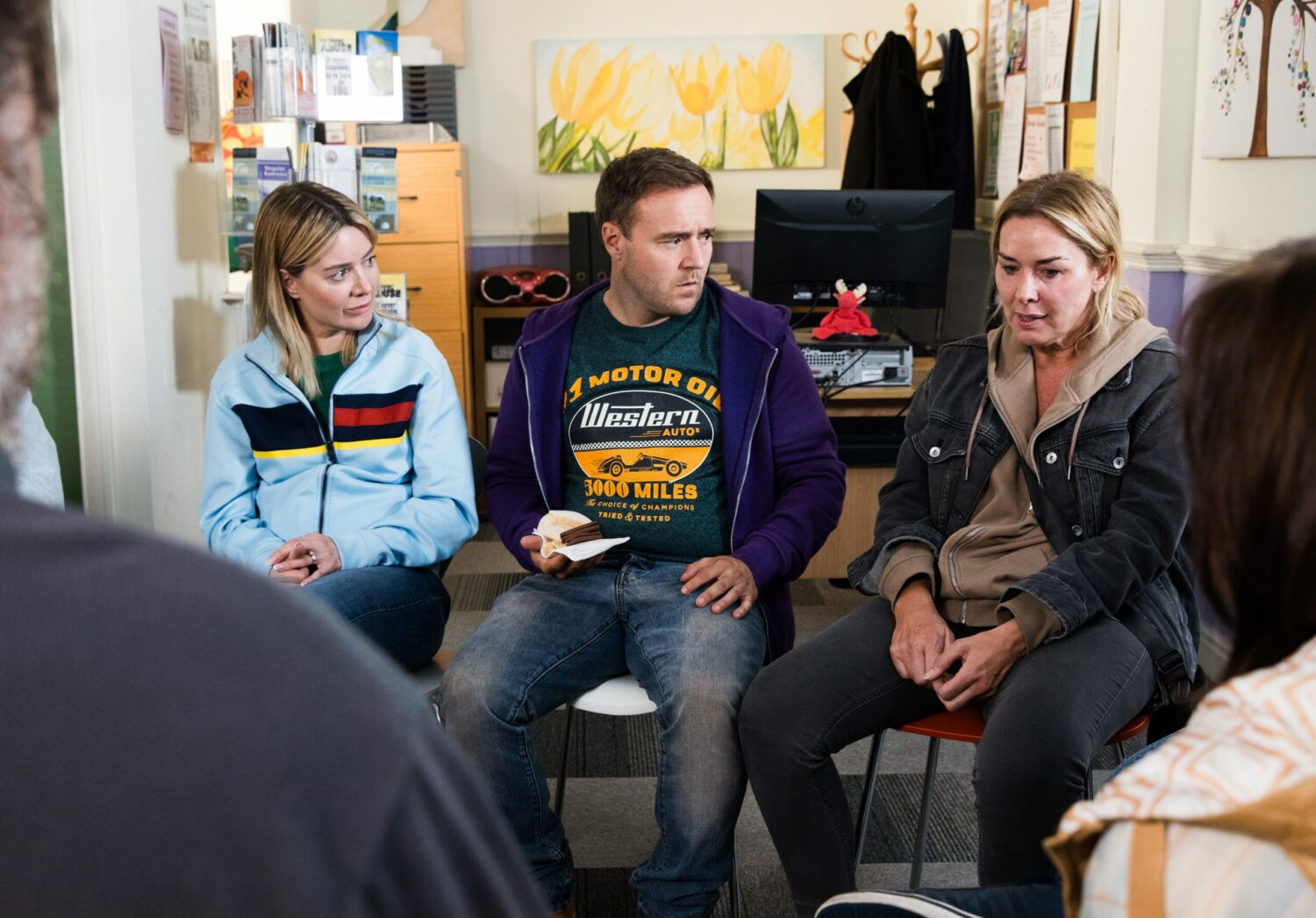 Coronation Street's Abi, Tyrone and Cassie are sitting together at the support group